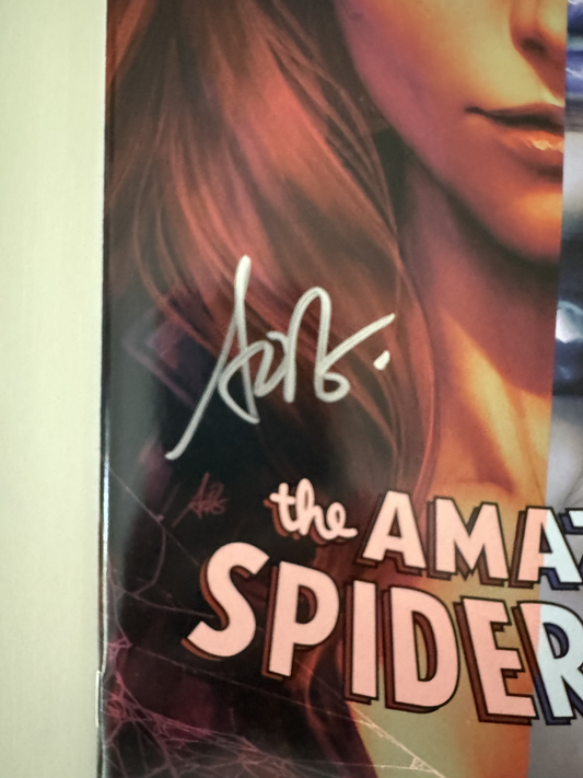 Close-up of Stanley "Artgerm" Lau’s signature on Amazing Spider-Man Comic Book #1 LGY #895 (2022).