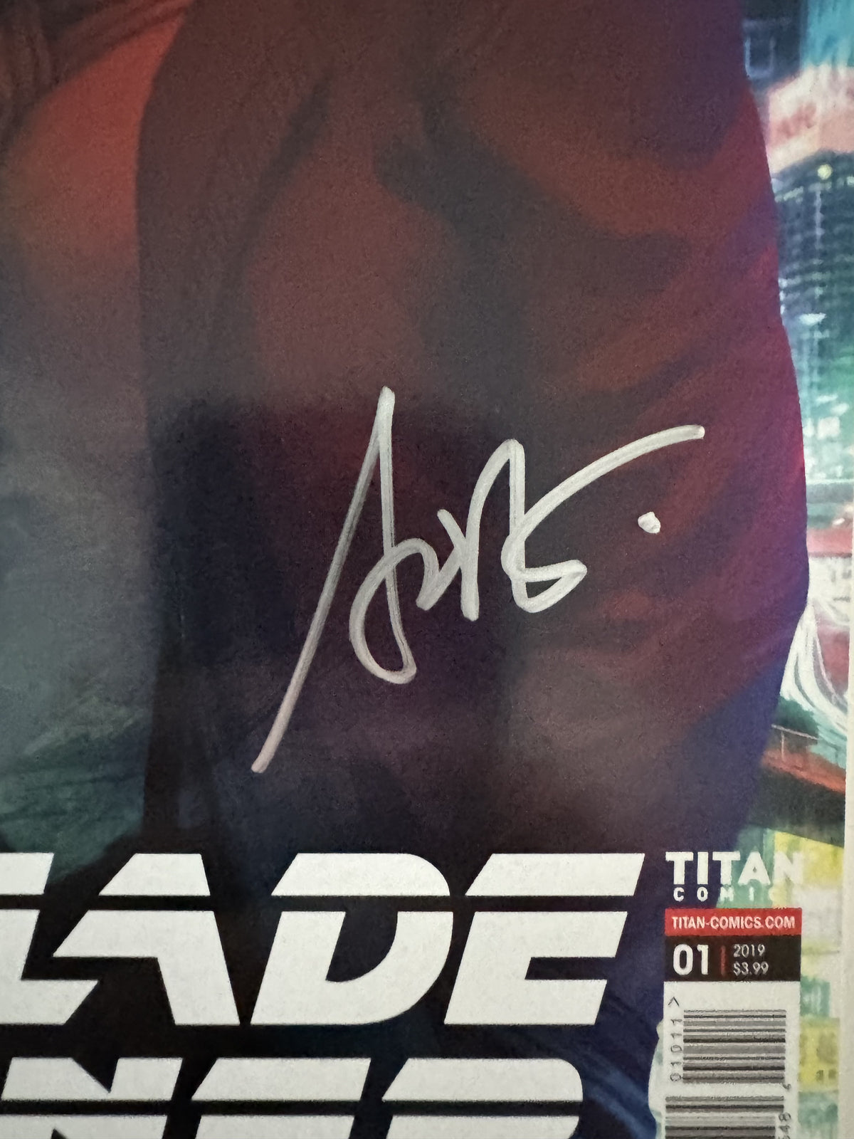 Close-up of Stanley "Artgerm" Lau’s signature on Blade Runner Comic Book Issue #1 (2019).
