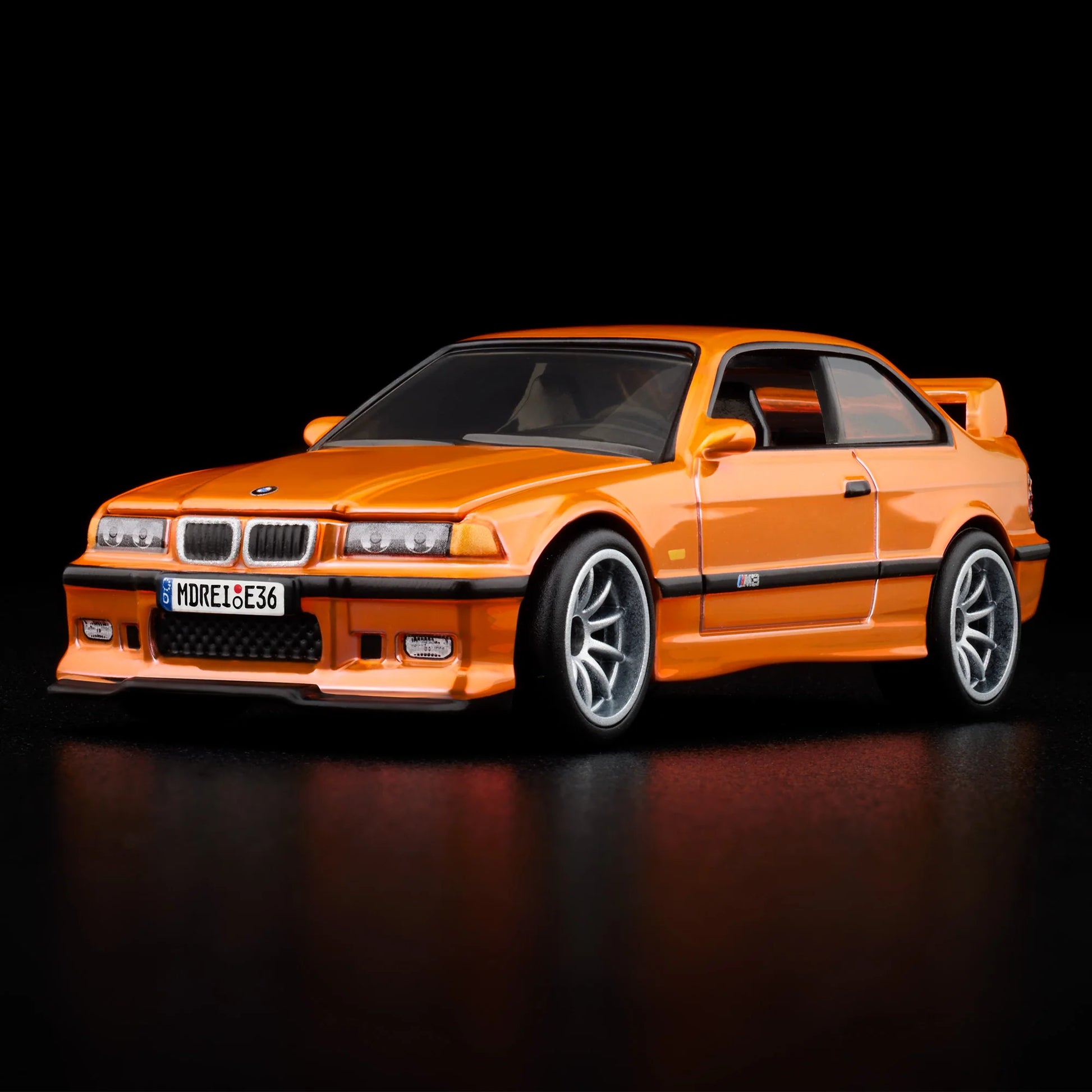 Side profile of Hot Wheels Collectors 1:64 BMW M3 LTW in orange