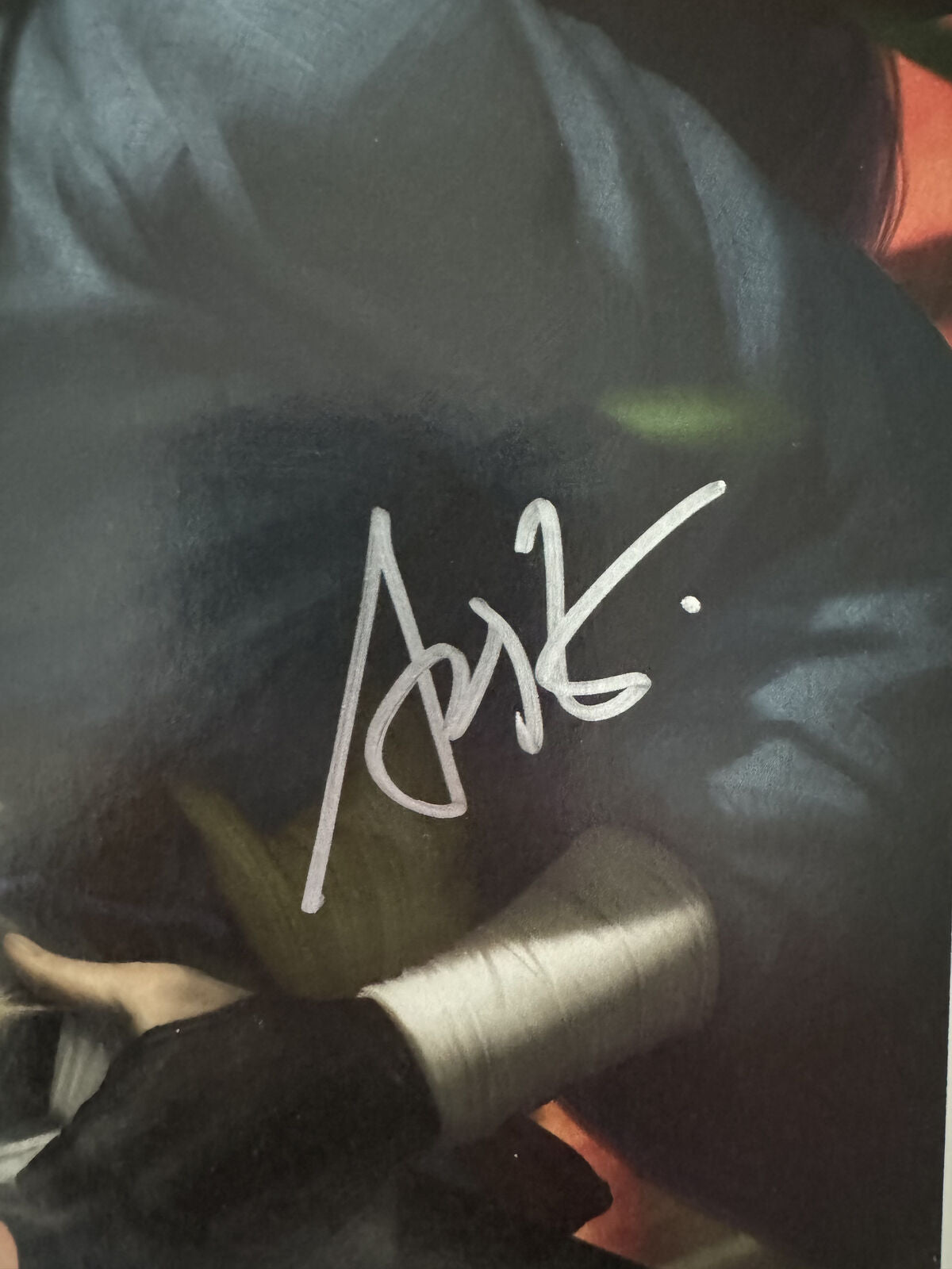 Close-up of Stanley "Artgerm" Lau’s signature on Demon Days X-Men Comic Book Issue #1 (2021).