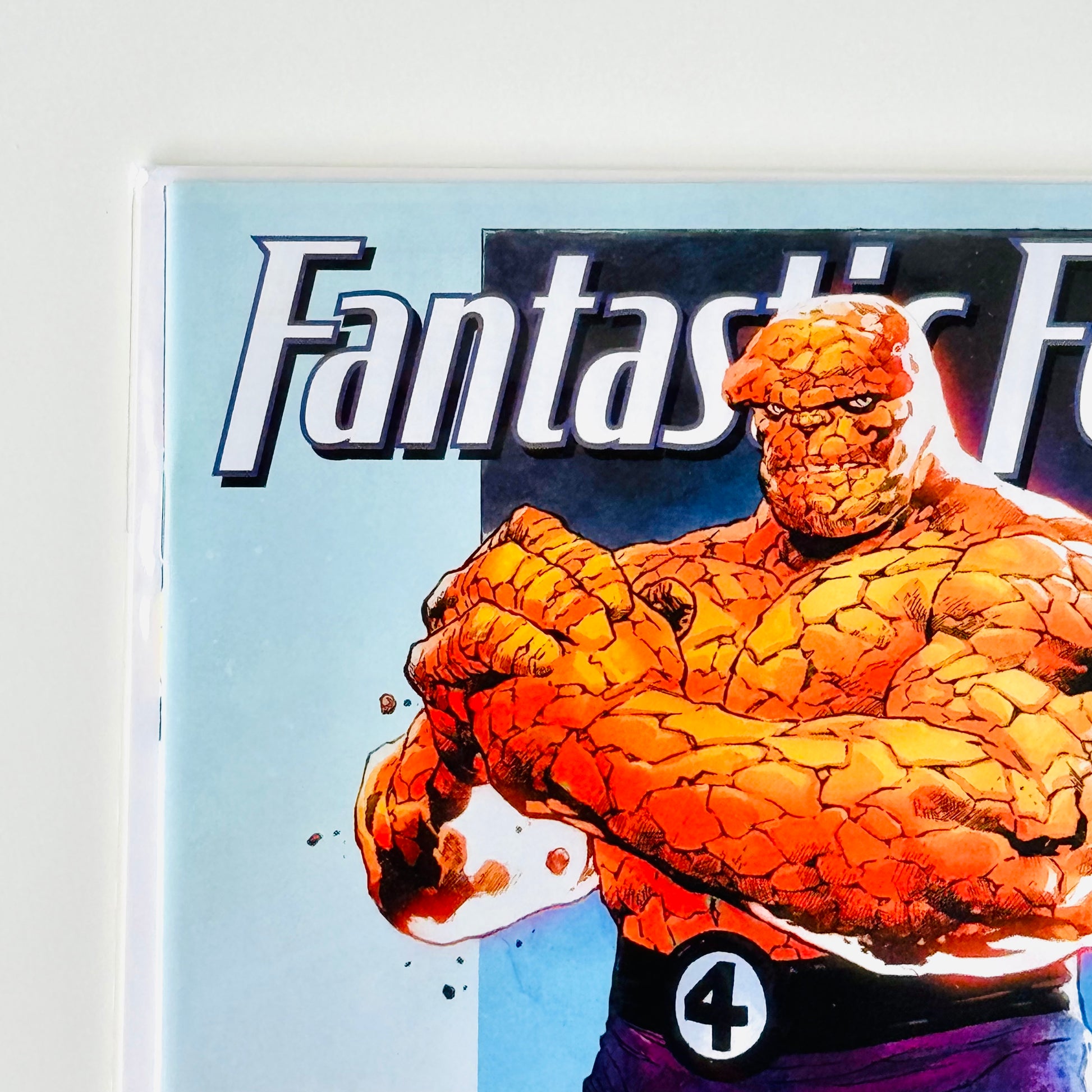 Top left corner close-up of Fantastic Four #1 1:25 Opeña Incentive Variant Cover