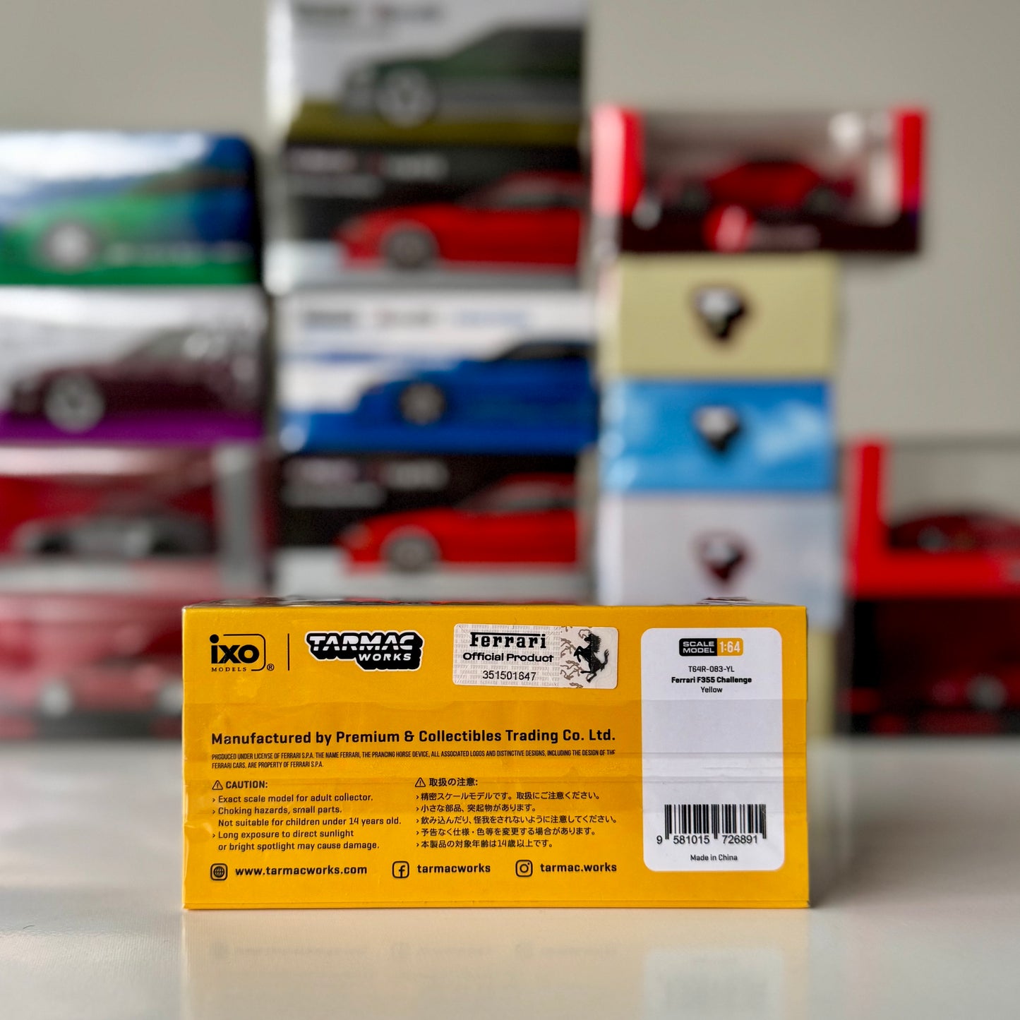 Rear view of Ferrari F355 Challenge Yellow model car in packaging