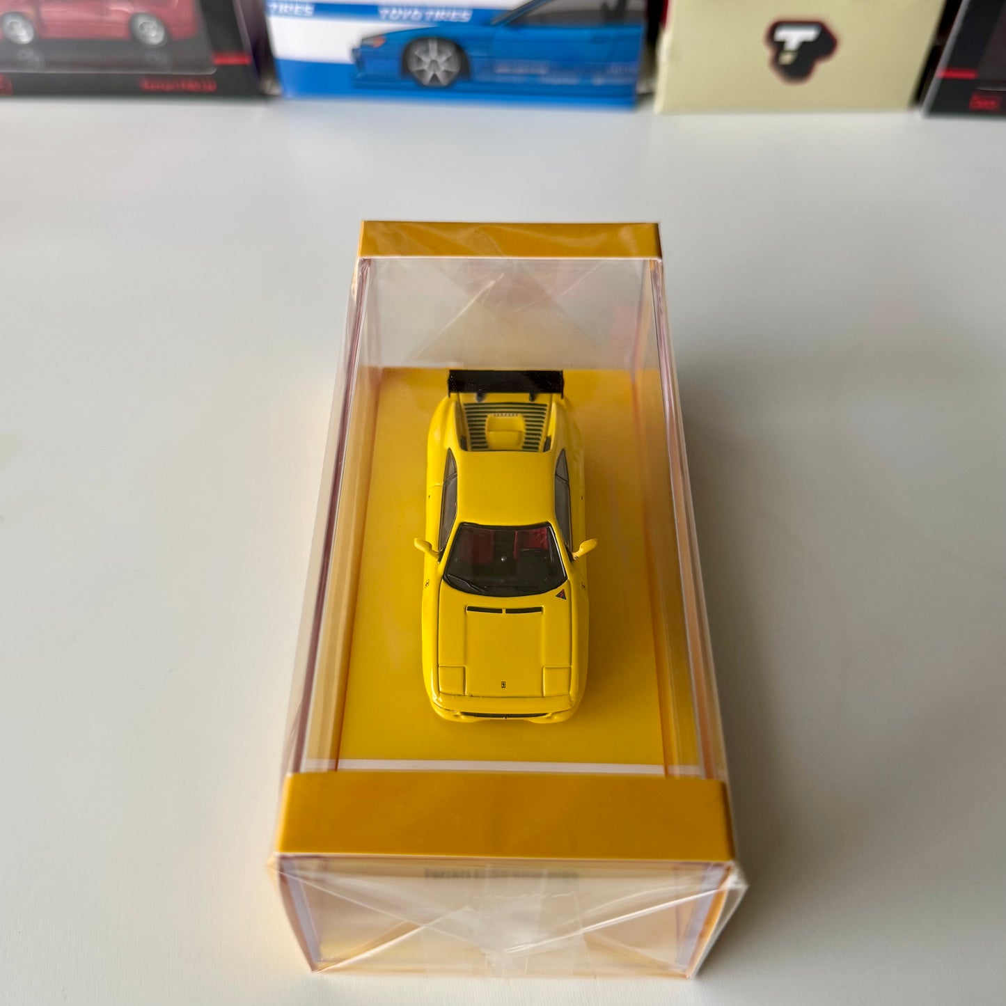 Top view of Ferrari F355 Challenge Yellow diecast car in box
