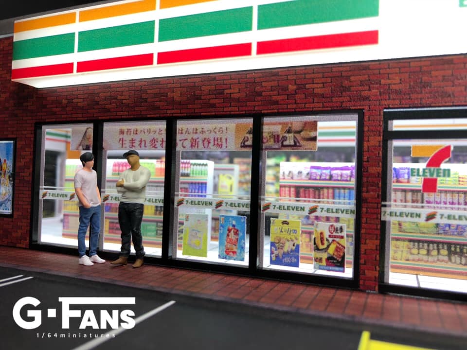 Side view of miniature 7-Eleven with parking lot
