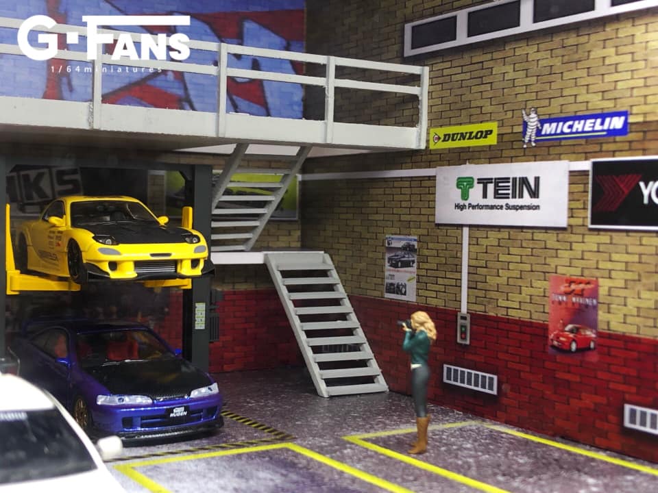 Top-down view showing two floors of JDM garage diorama by G-Fans