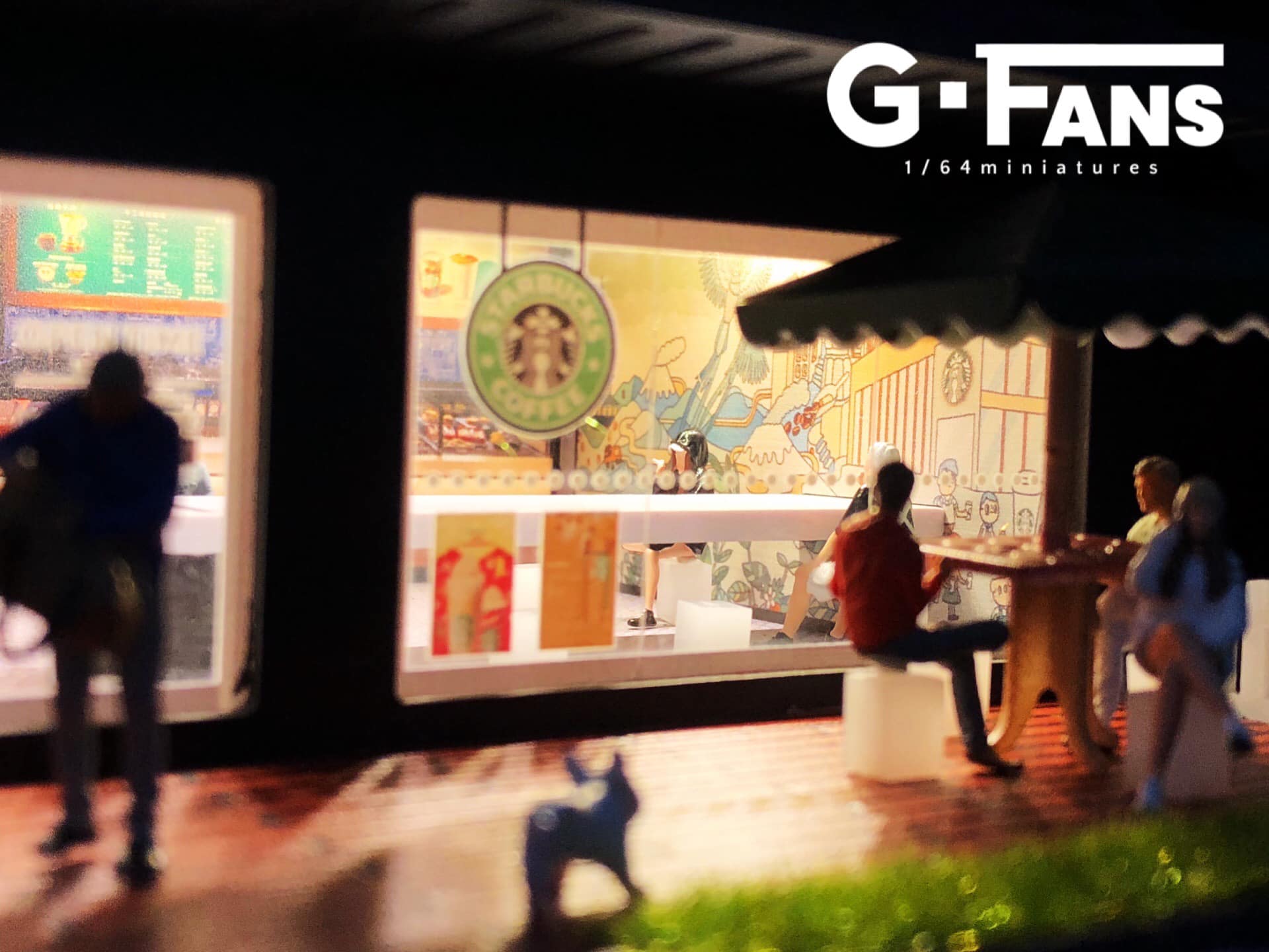 Close-up of G-Fans Starbucks diorama with realistic storefront and LED lighting