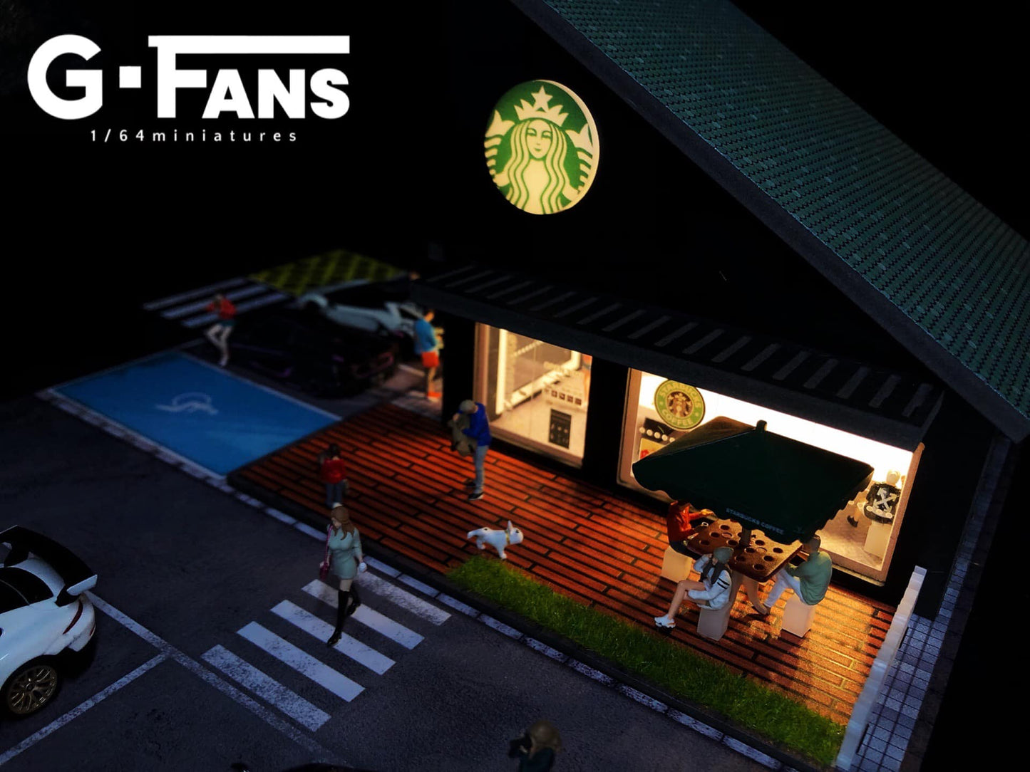 Top-down view of Starbucks miniature diorama with parking lot layout