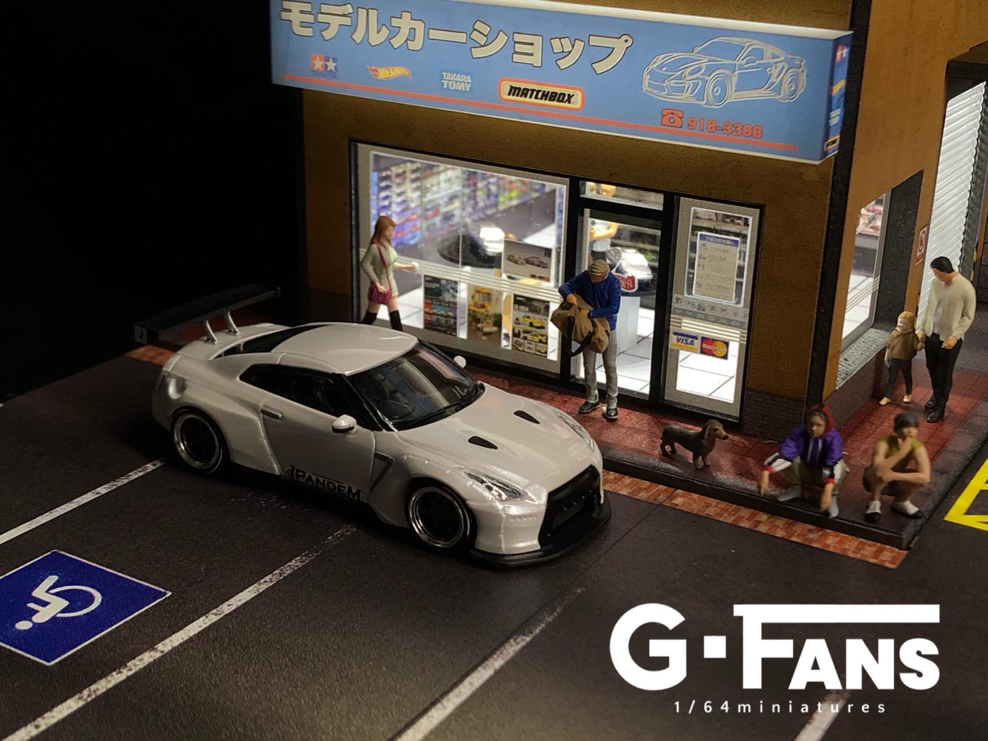 Front view of G-Fans Japanese Model Car Shop Diorama in 1:64 scale