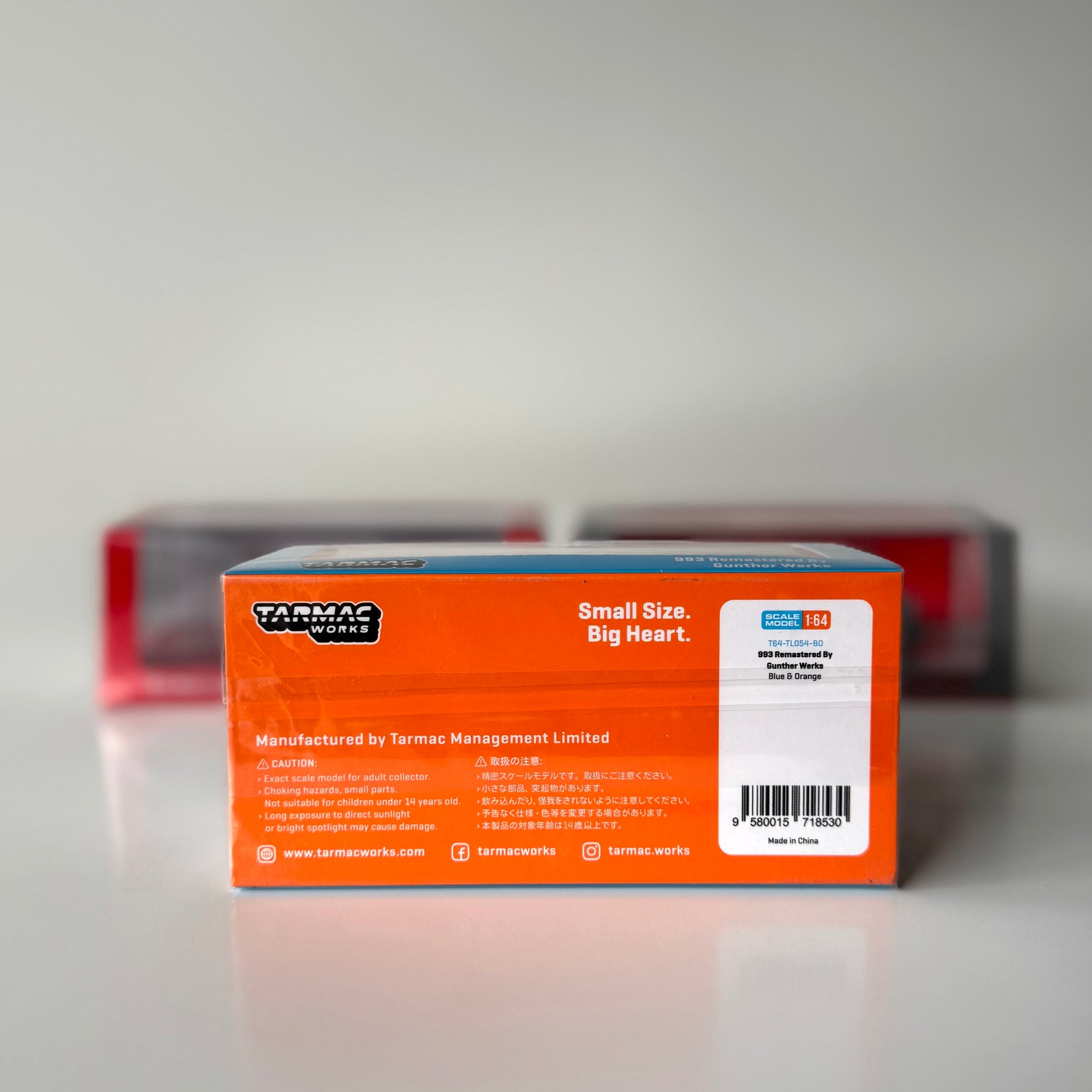 Rear packaging of Tarmac Works Porsche 993 Blue & Orange diecast model