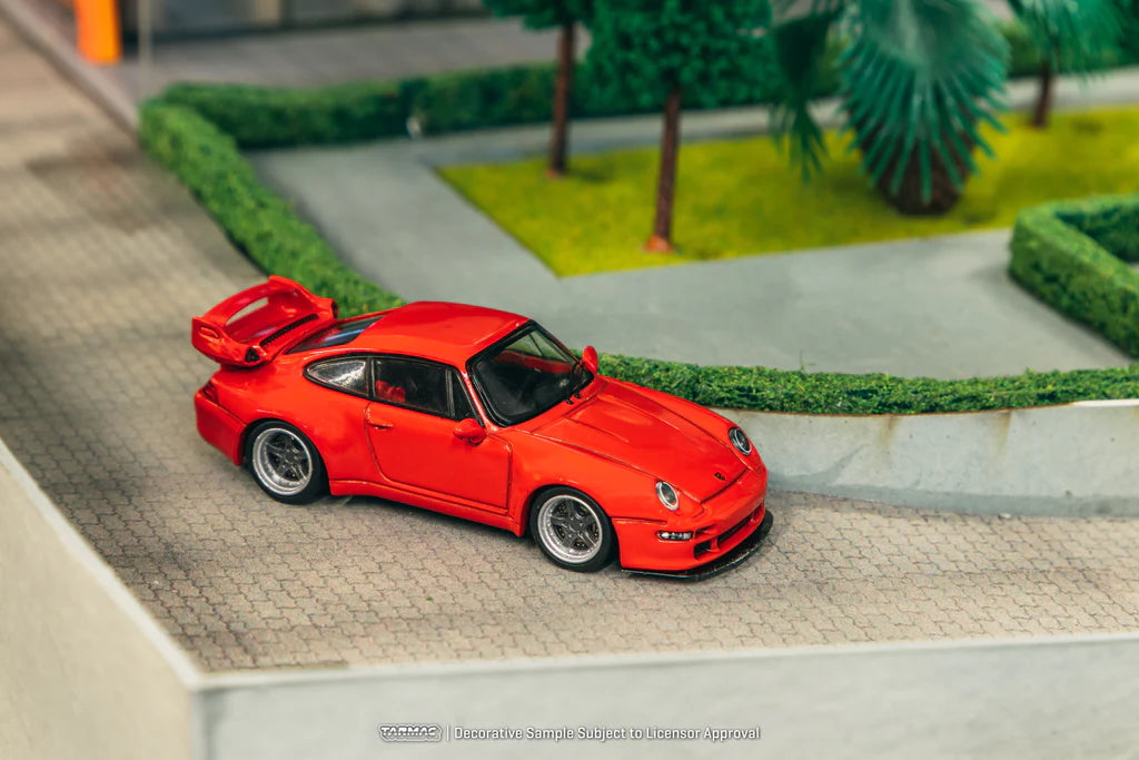 Porsche 993 Gunther Werks Red 1:64 scale model on display in diorama