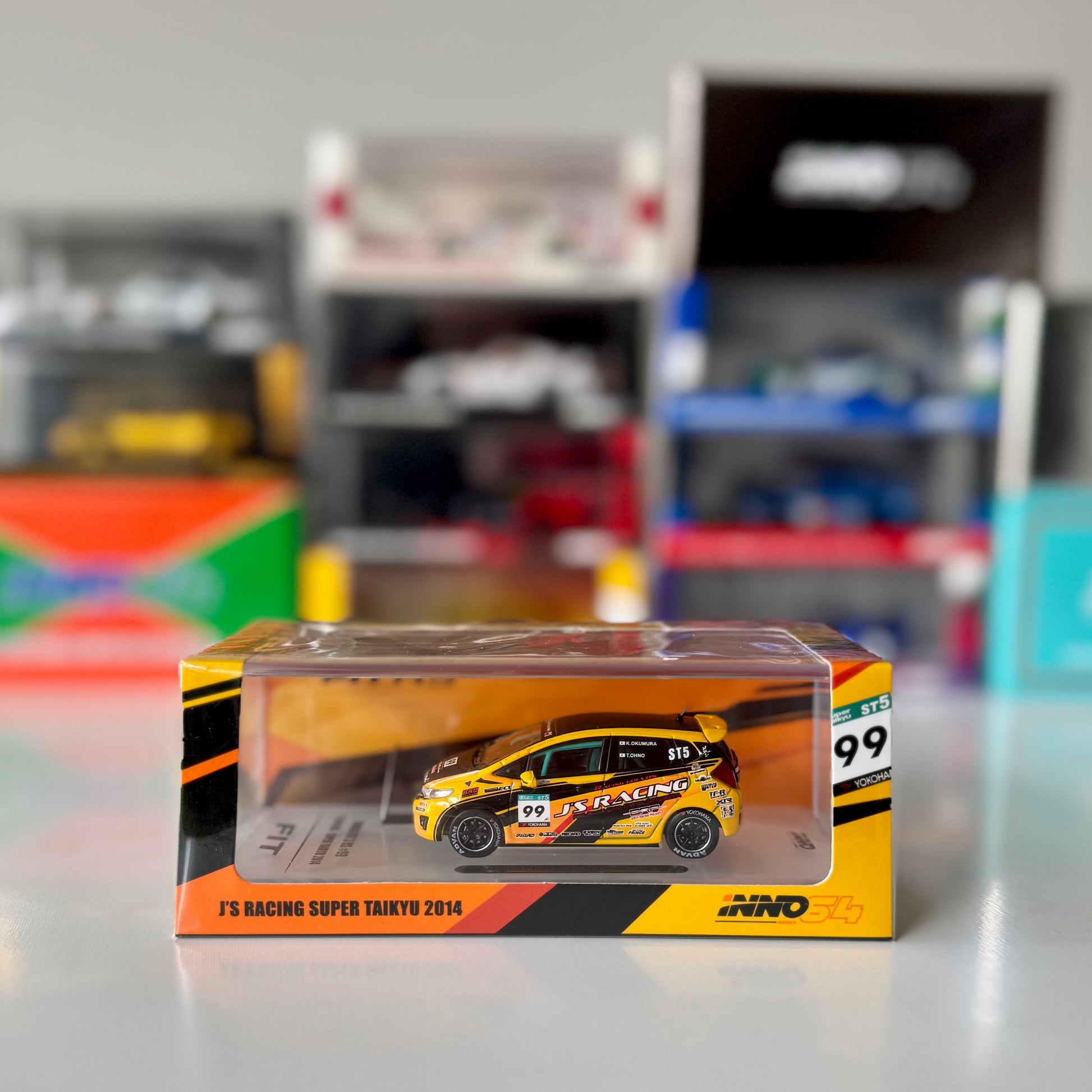 Front view of INNO64 Honda Fit 3 RS #99 J’S Racing Super Taikyu 2014 diecast model