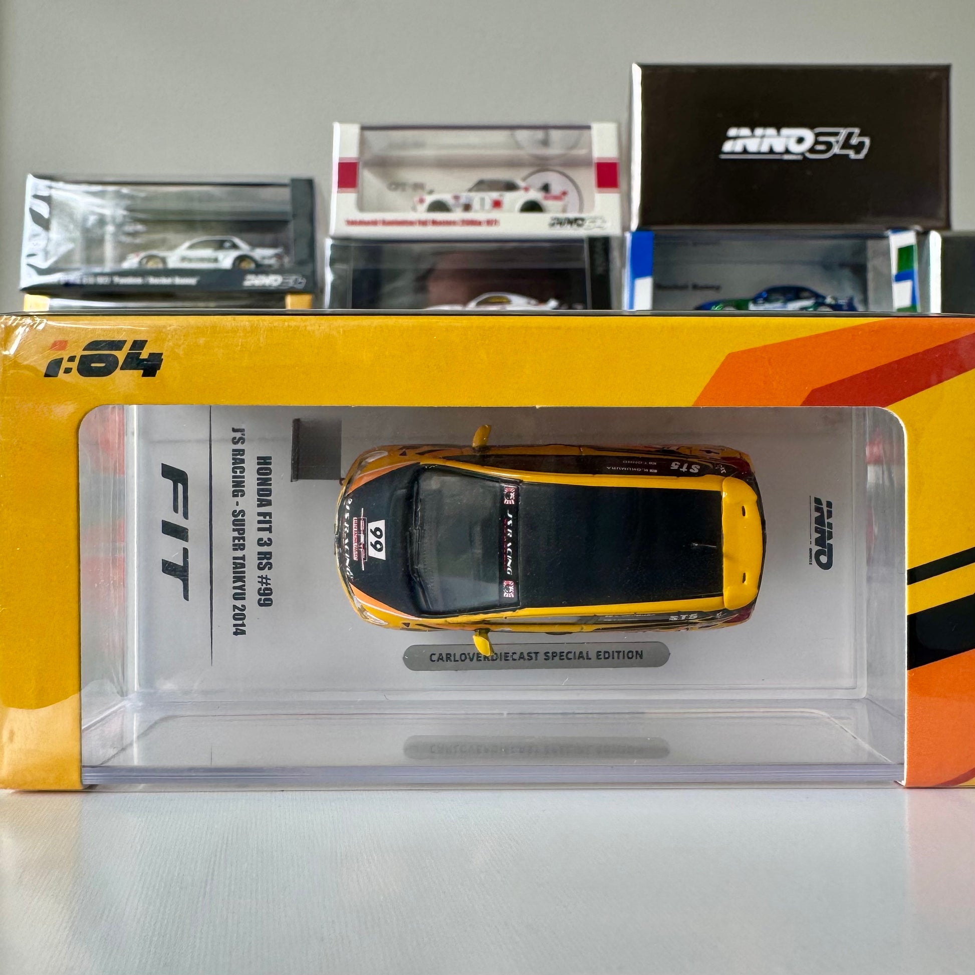 Top-down view of Honda Fit 3 RS #99 J’S Racing 1:64 diecast – CarloverDiecast exclusive