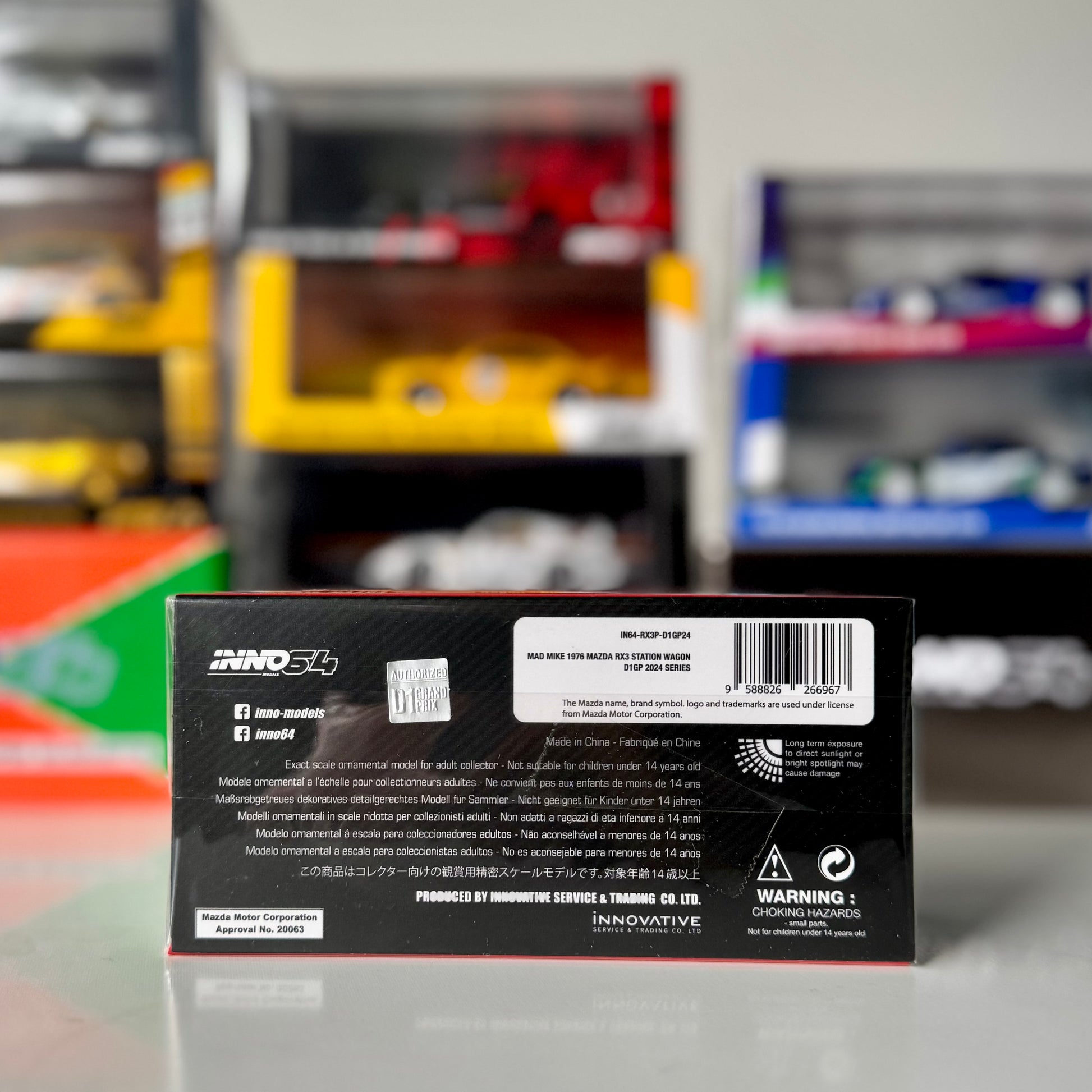 Back view of INNO64 RX-3 Station Wagon Mad Mike drift car – D1GP 2024 edition