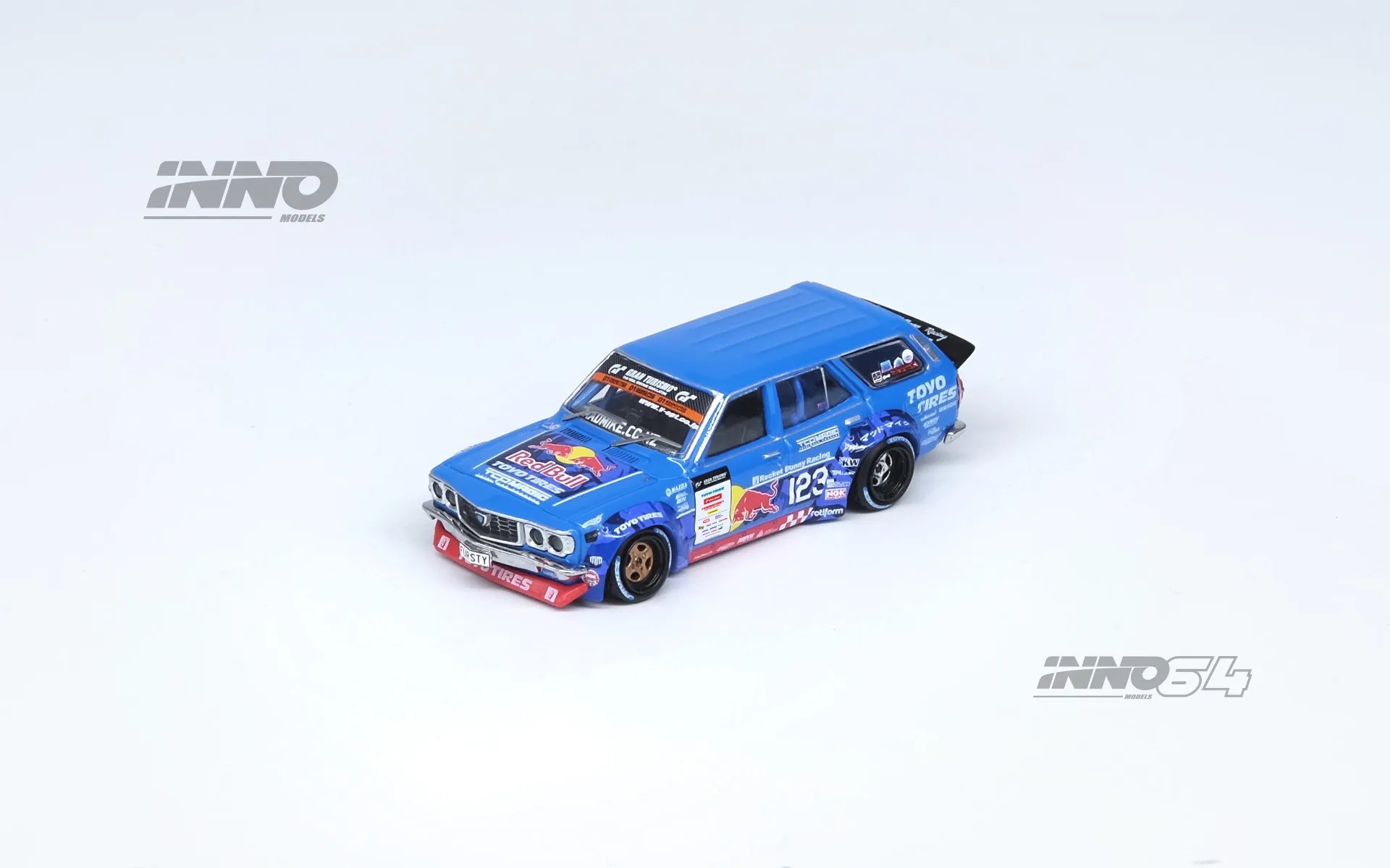 Front view of INNO64 Mazda RX-3 Wagon Mad Mike D1GP 2024 diecast model