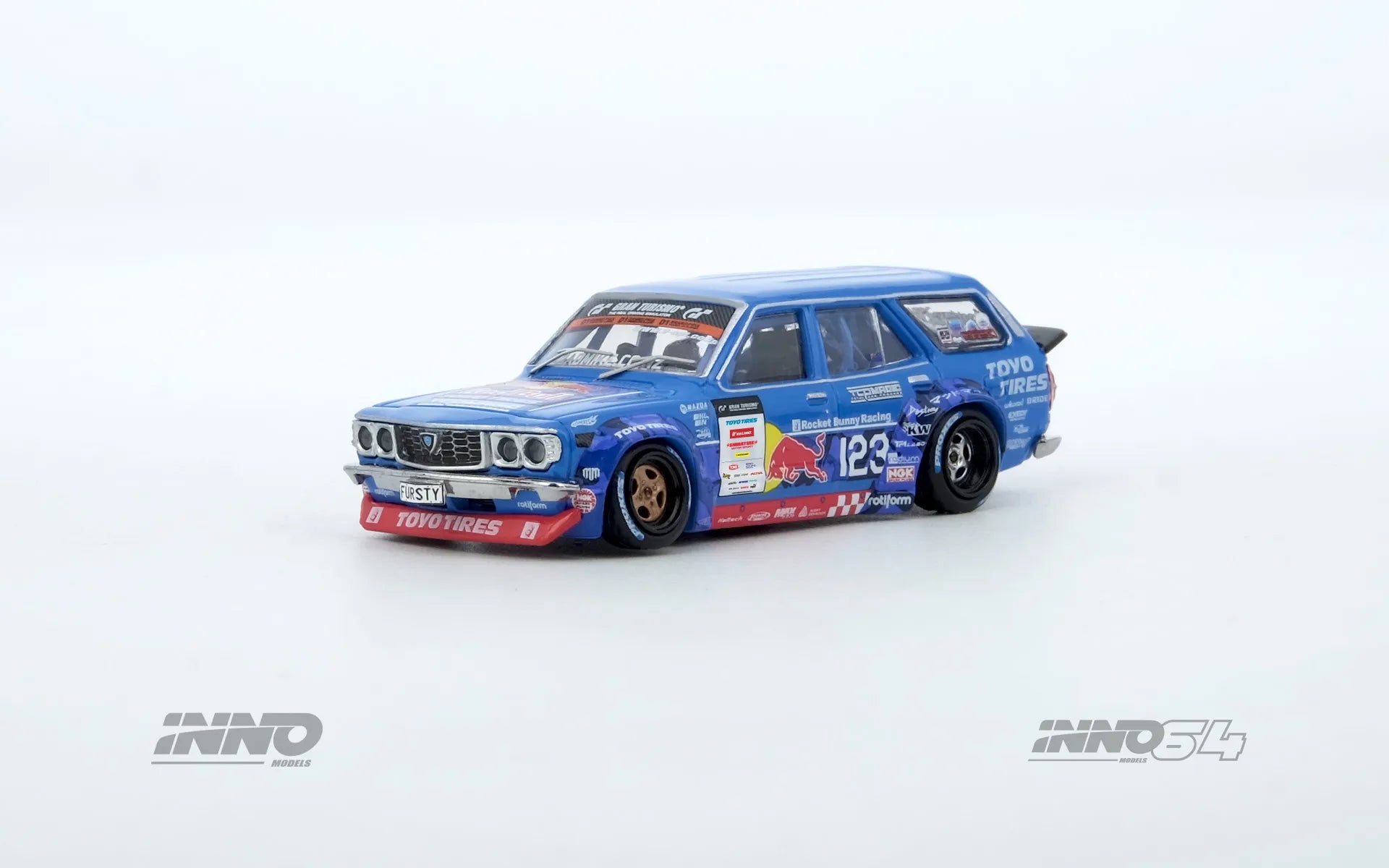 Front view of INNO64 Mazda RX-3 Wagon Mad Mike D1GP 2024 diecast model