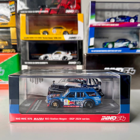 Front view of INNO64 Mazda RX-3 Wagon Mad Mike D1GP 2024 diecast model
