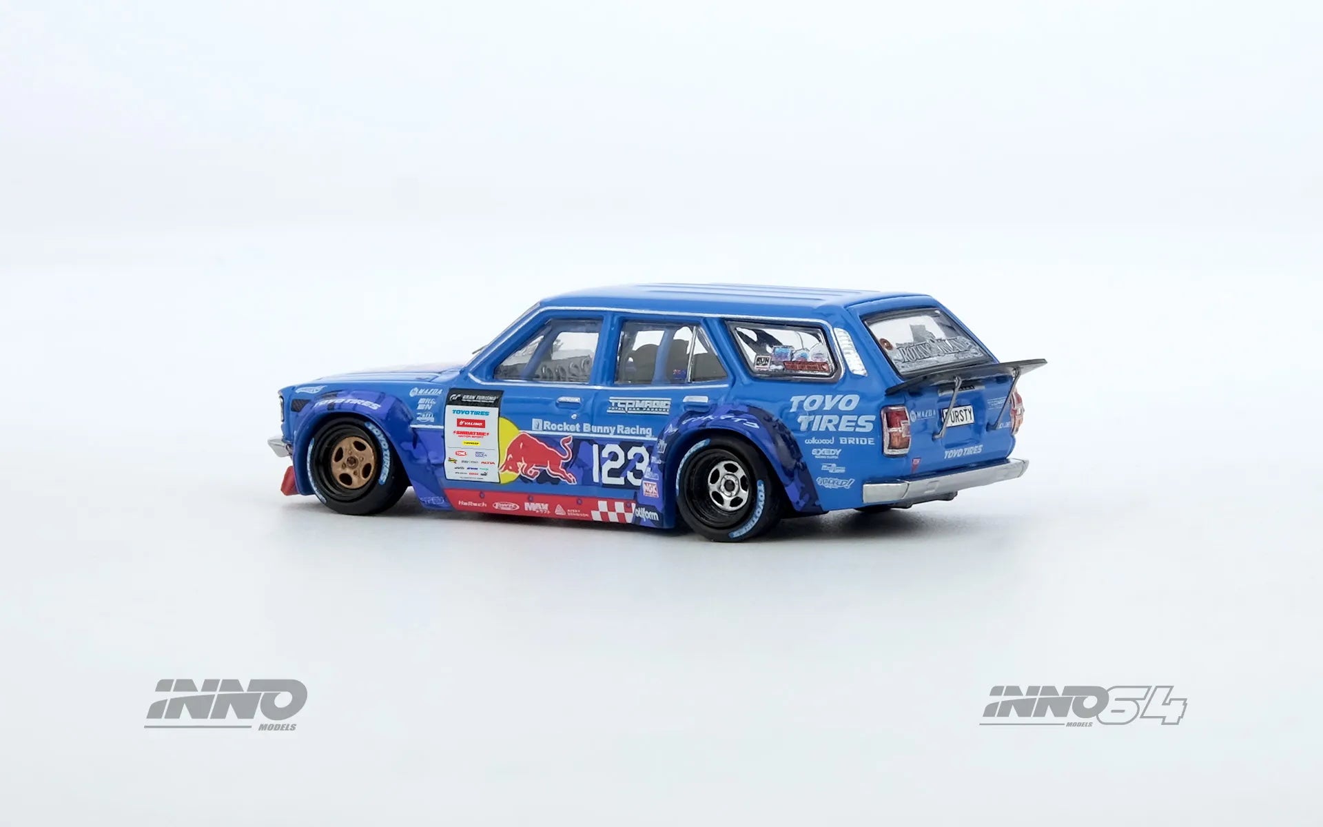 Side profile of Mad Mike 1976 Mazda RX-3 Wagon – D1GP 2024 INNO64 1:64 model