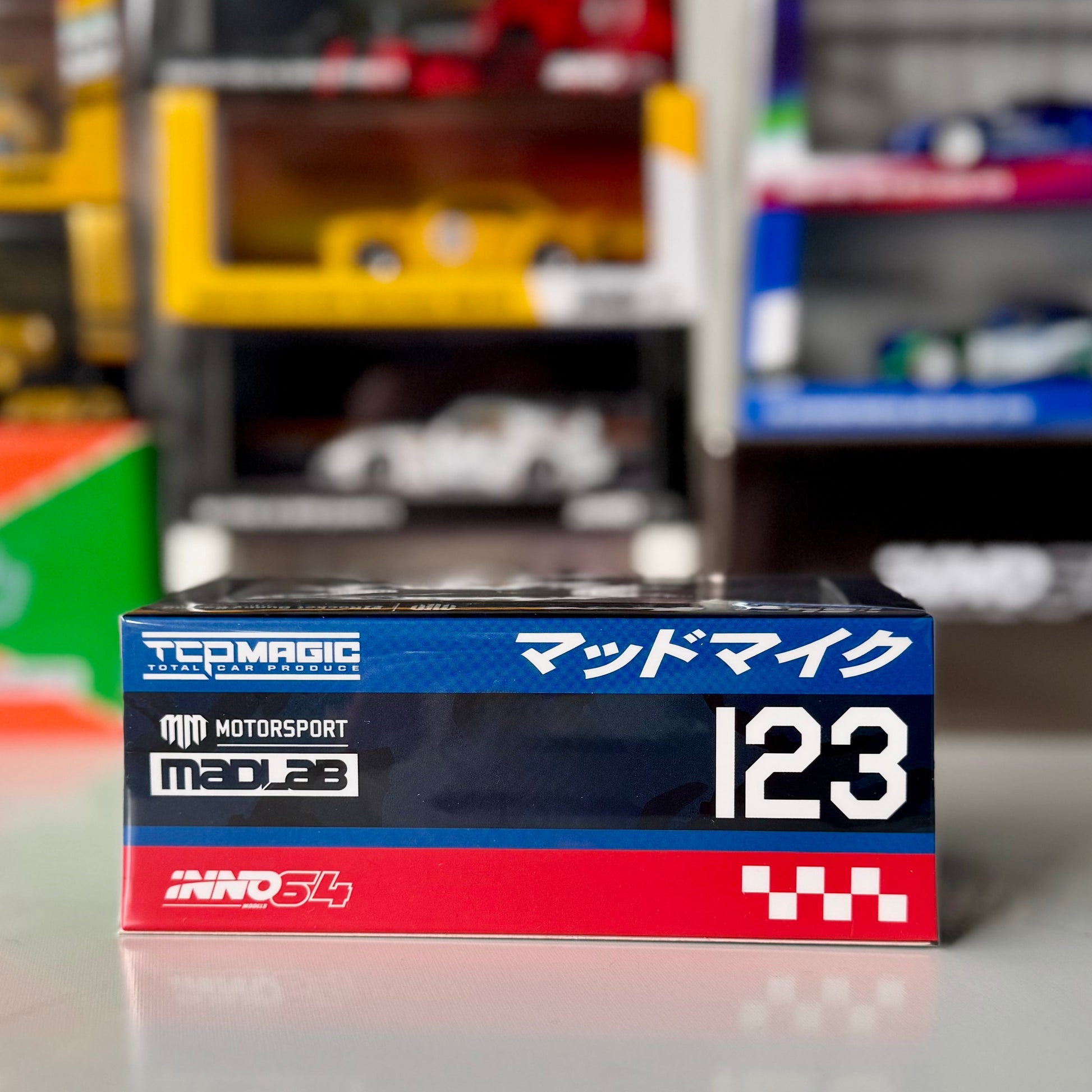 Side profile of Mad Mike 1976 Mazda RX-3 Wagon – D1GP 2024 INNO64 1:64 model