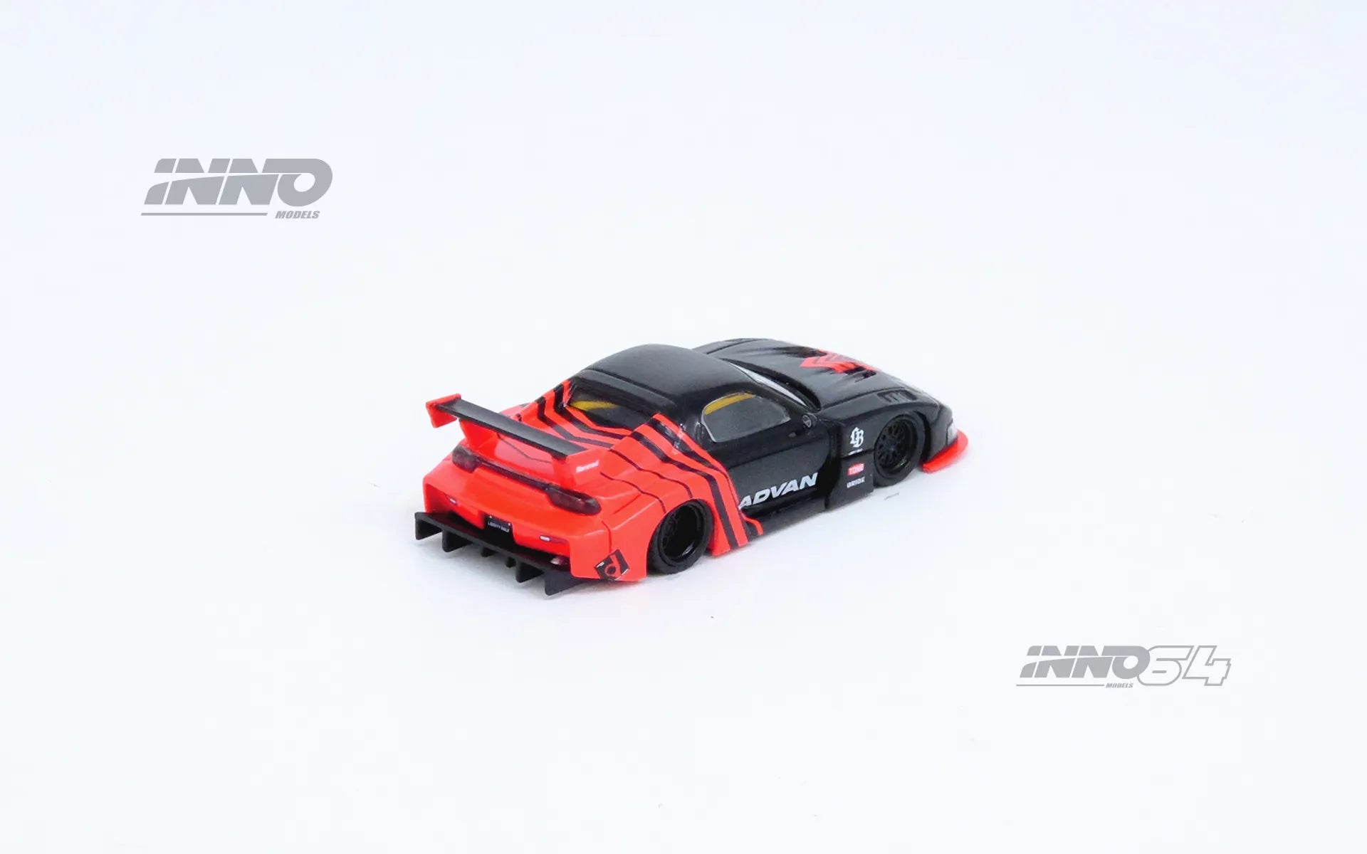 Rear view of INNO64 LBWK Mazda RX-7 Super Silhouette – Advan edition diecast unboxed