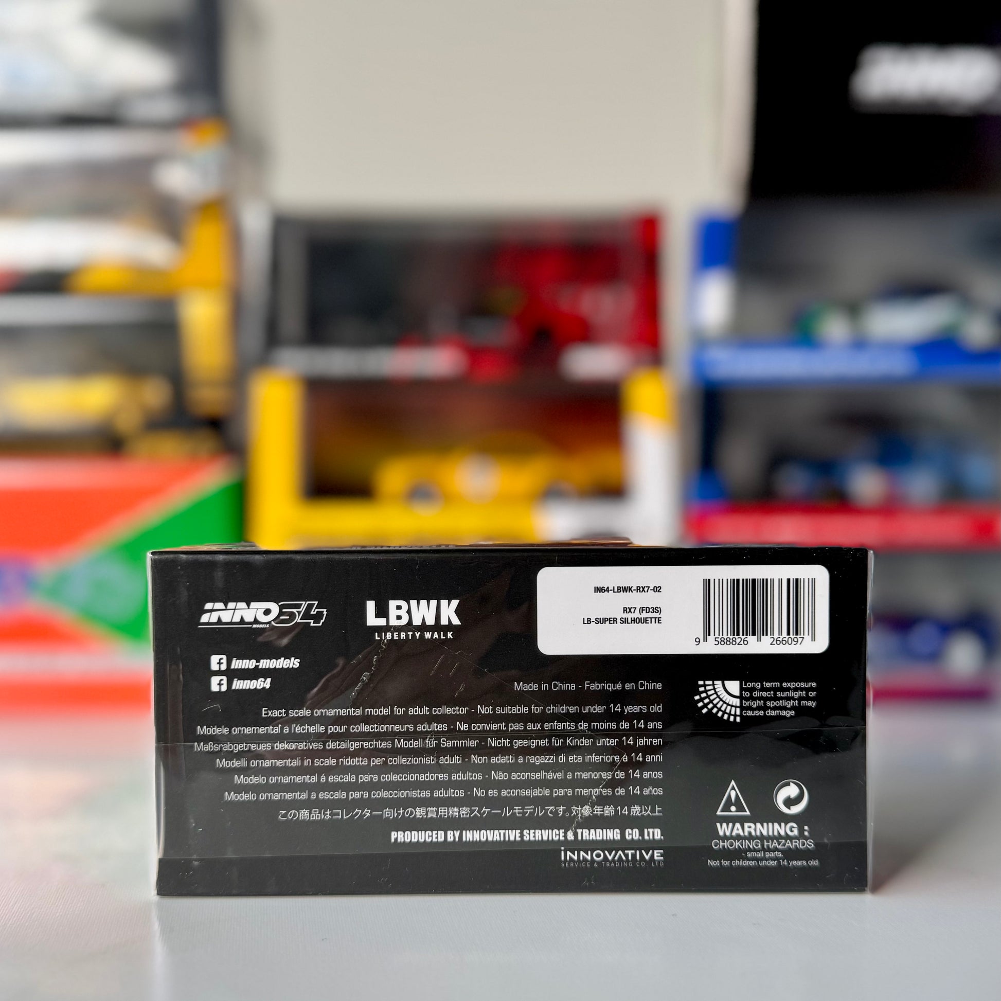 Back view of INNO64 Liberty Walk Mazda RX-7 FD3S White #41 diecast model