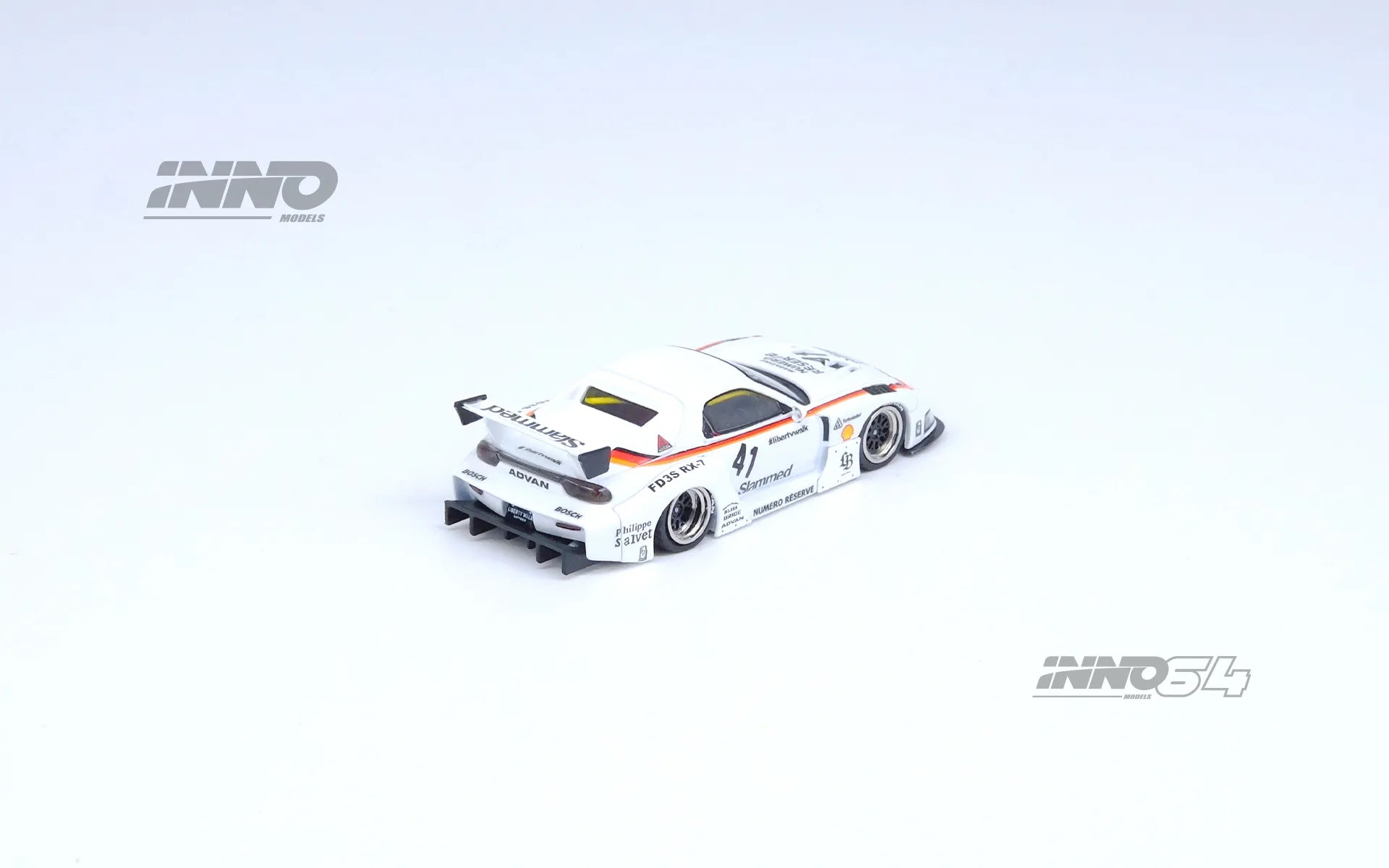 Side profile of INNO64 LB-Super Silhouette Mazda RX-7 in white with #41 livery unboxed