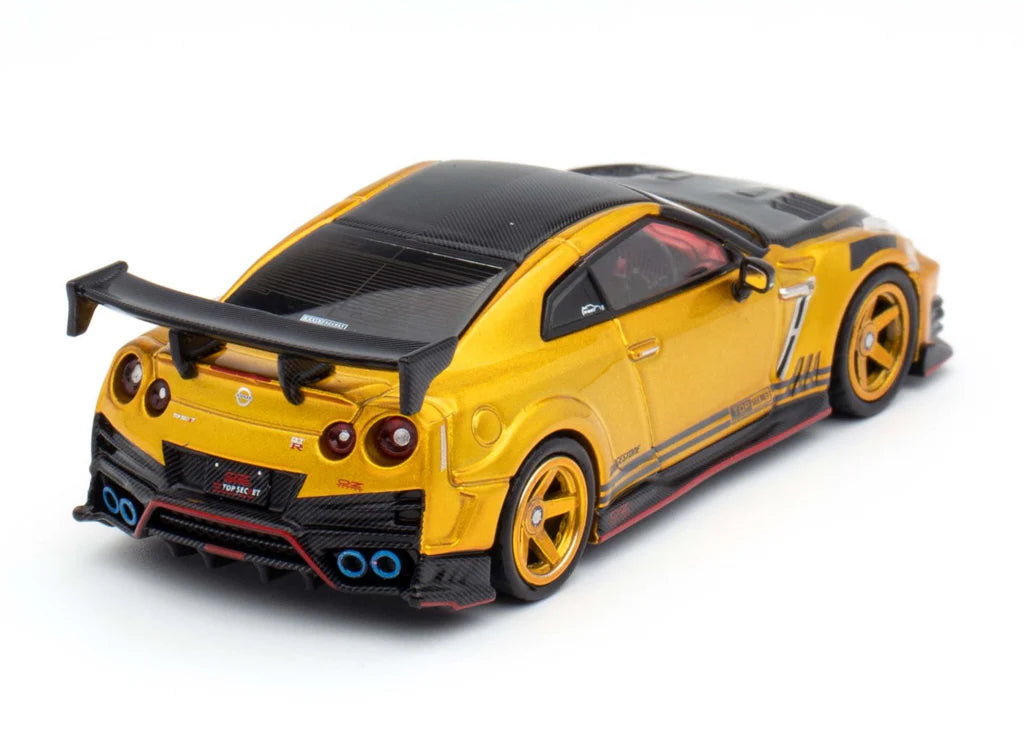 Rear view of INNO64 GT-R R35 Top Secret in gold livery – KL Expo exclusive