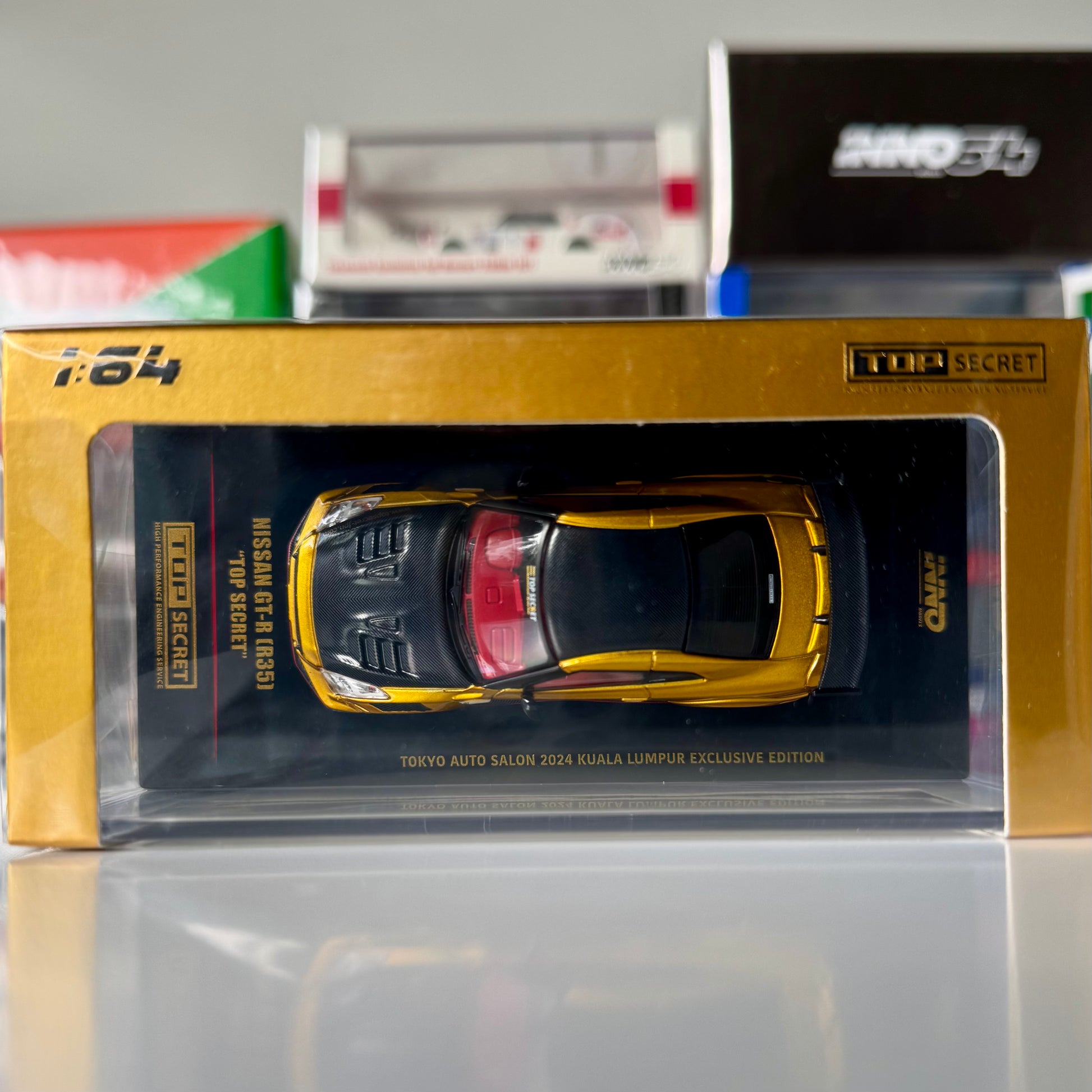 Top-down view of INNO64 Nissan GT-R R35 in gold – Kuala Lumpur Expo edition