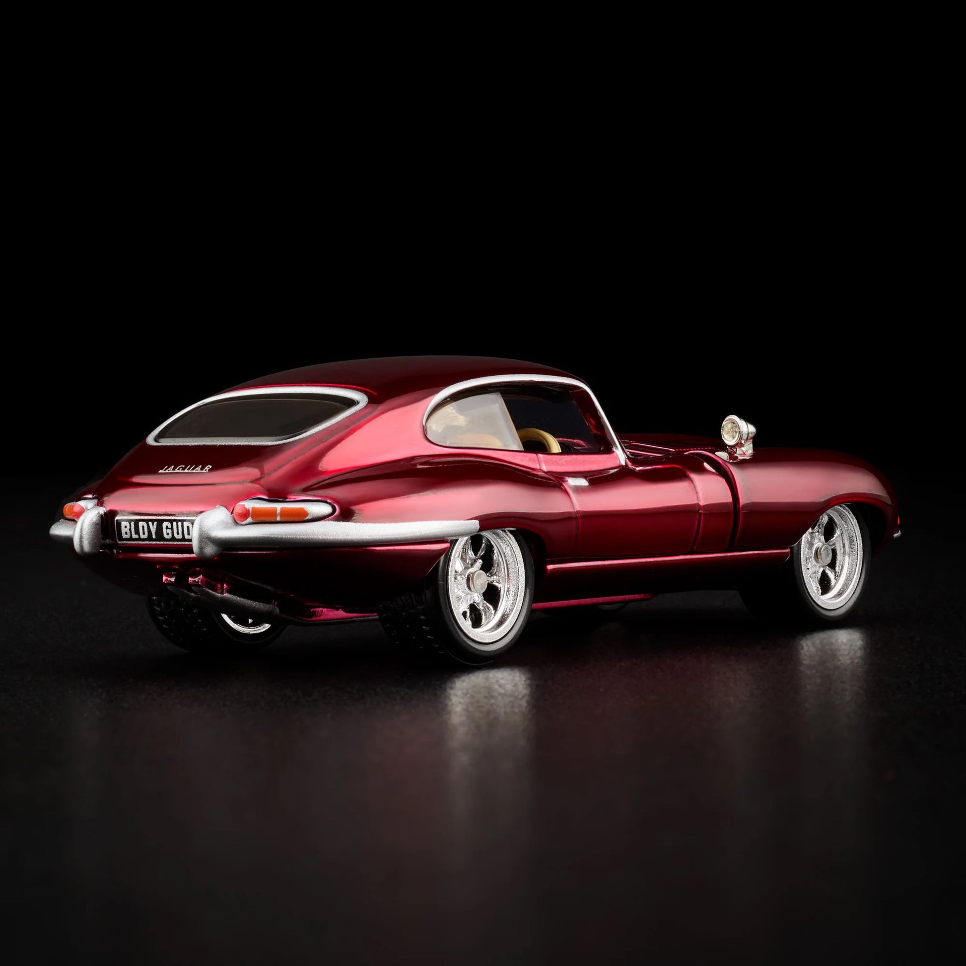 Close-up of the side profile on unboxed 1964 Jaguar E-Type RLC model car