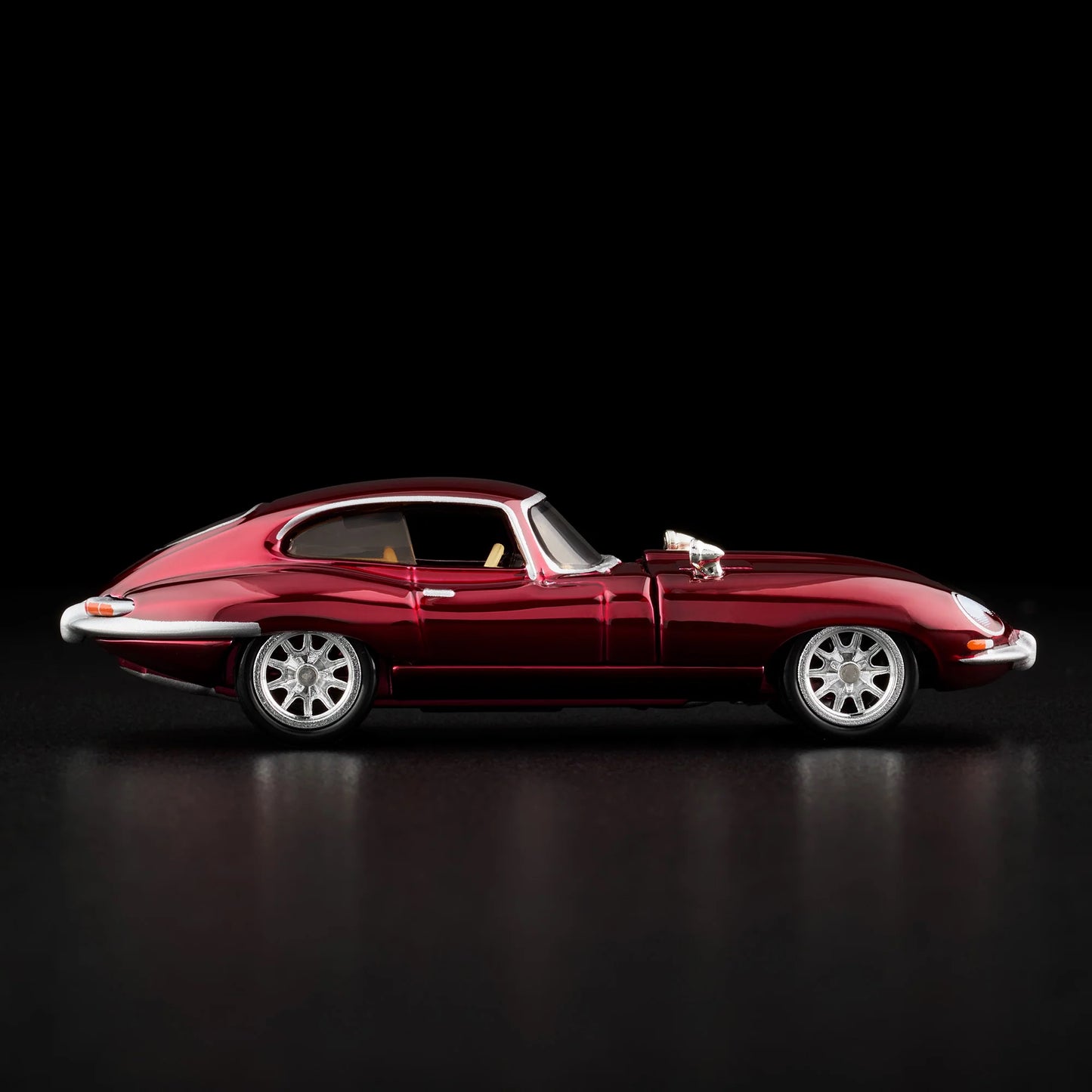 Close-up of the side profile on unboxed 1964 Jaguar E-Type RLC model car