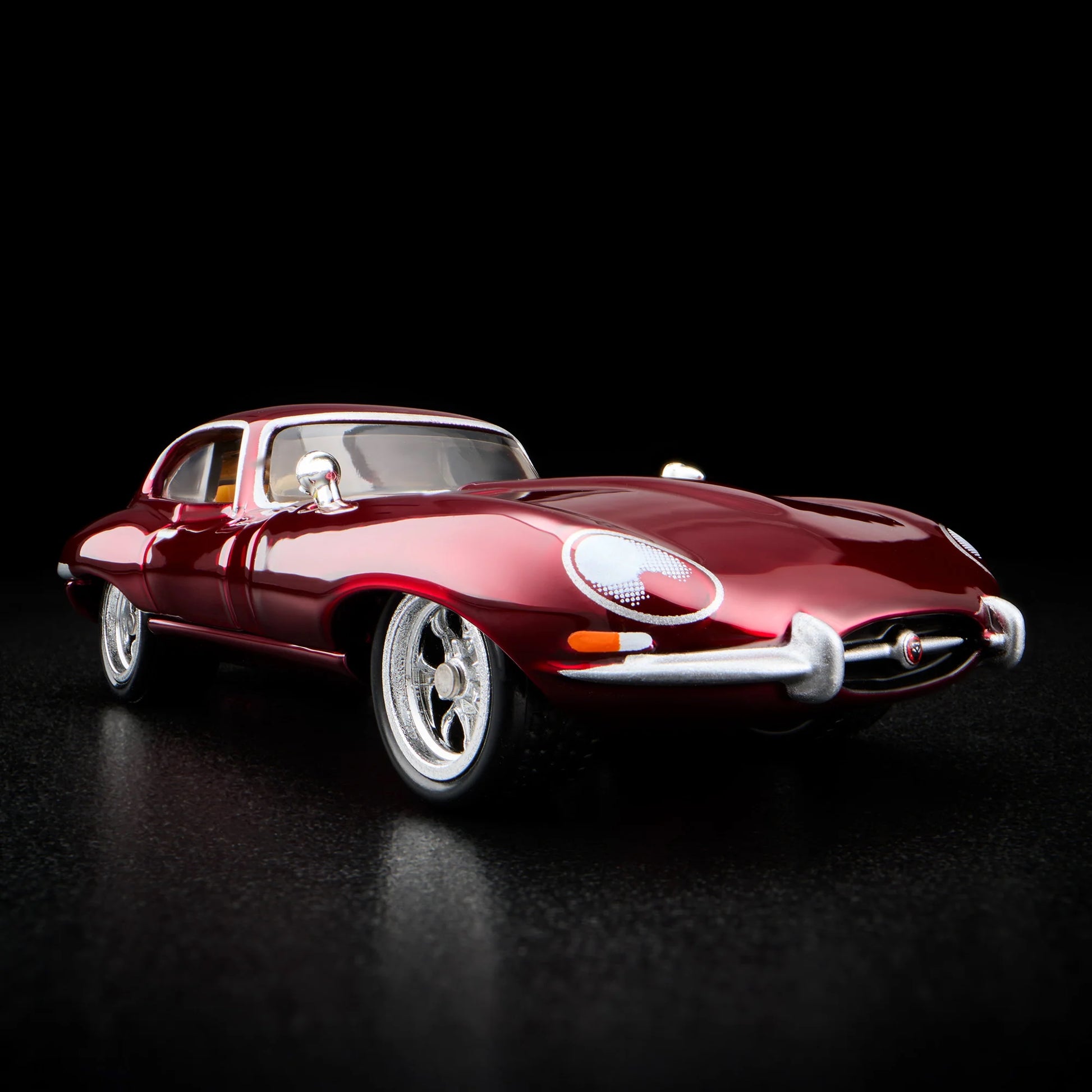Close-up of the side profile on unboxed 1964 Jaguar E-Type RLC model car