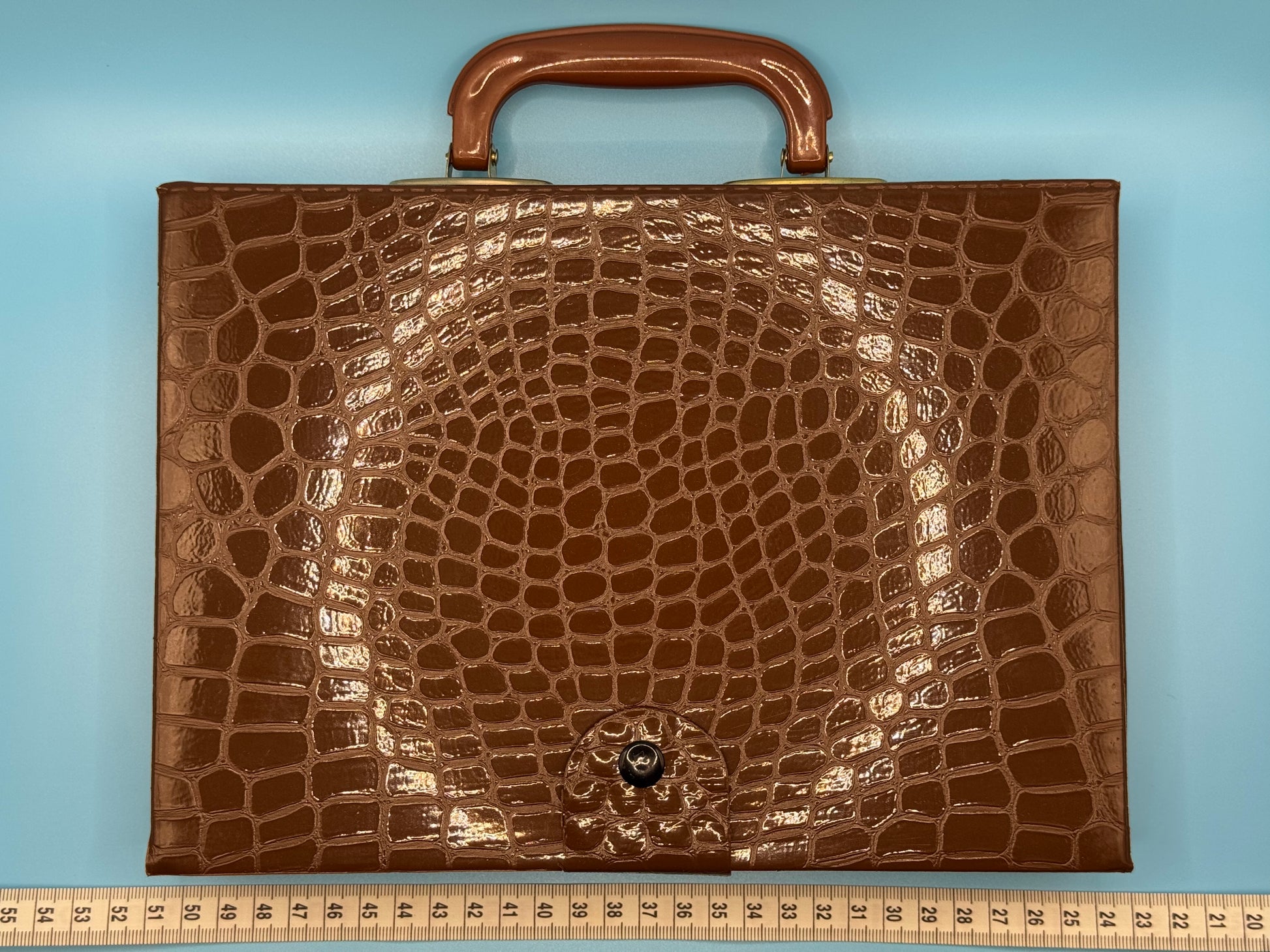 Front view of Mahjong Travel Set compact carrying case with elegant design