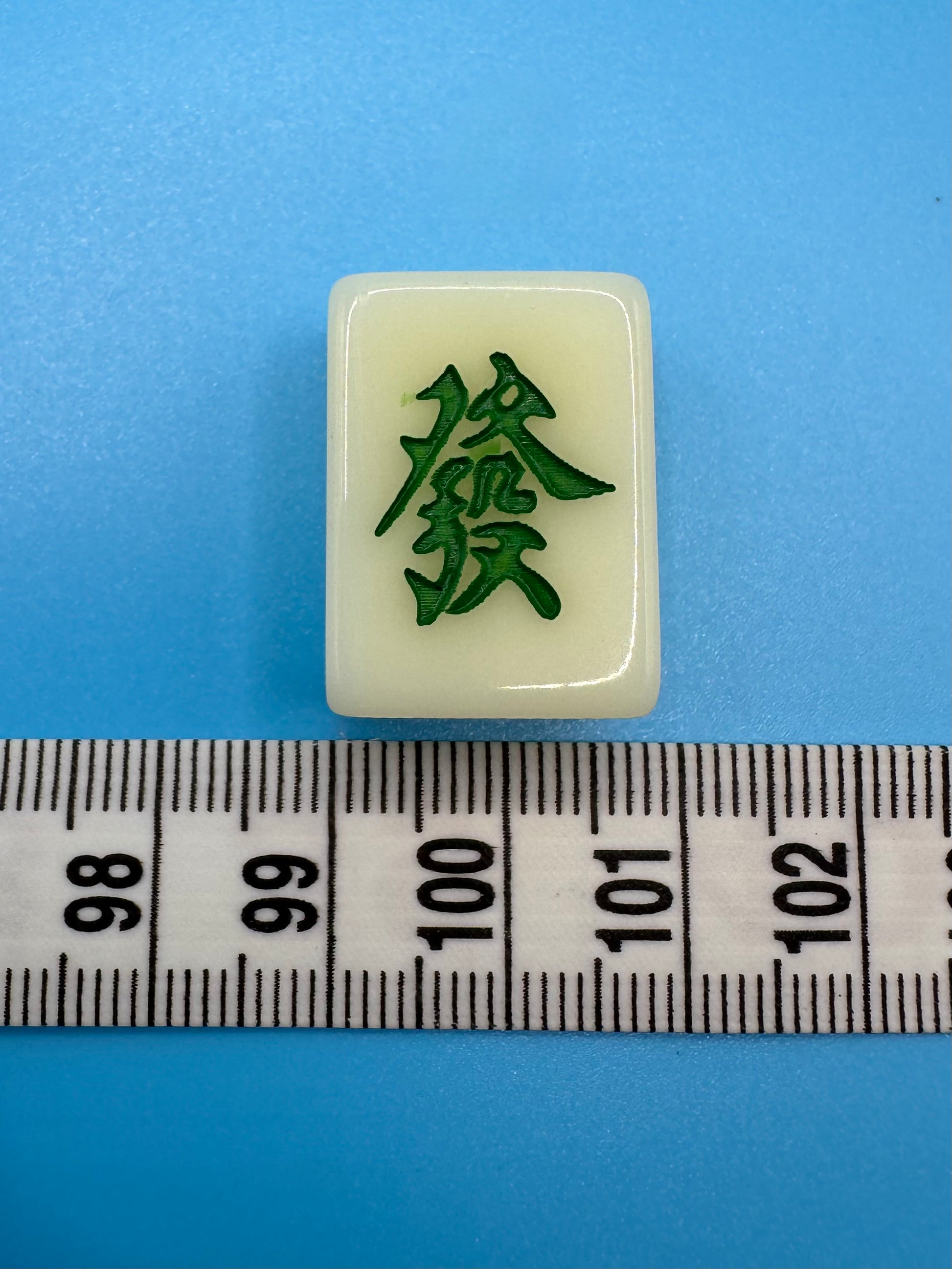 Comparison showing compact Mahjong tile size