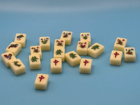 Close-up of Mahjong tiles featuring clear traditional Chinese markings