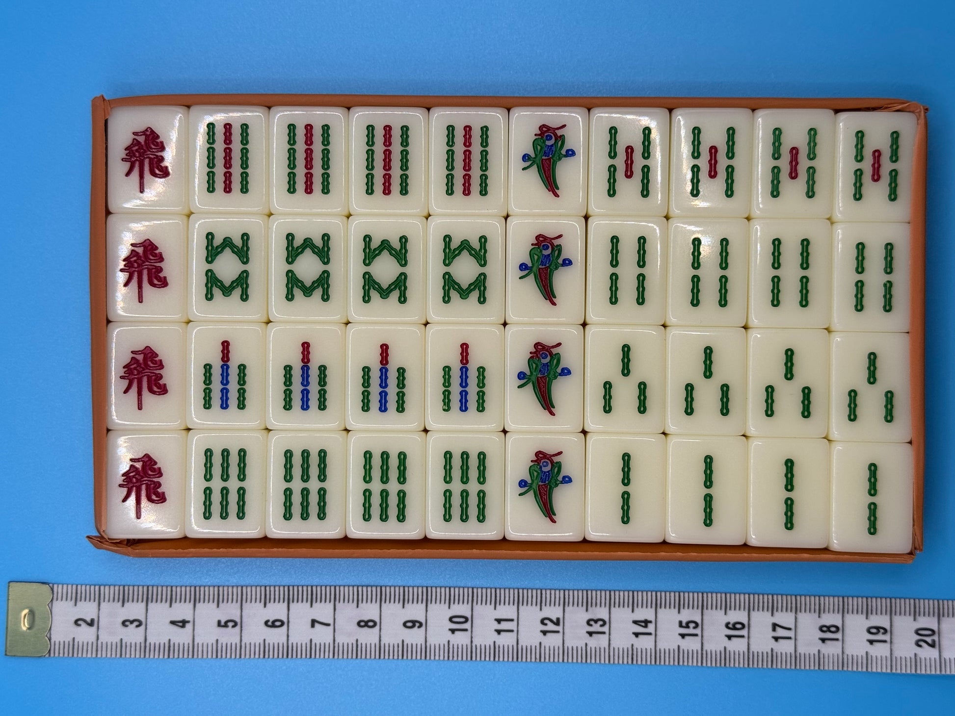 Close-up of Mahjong tiles featuring clear traditional Chinese markings