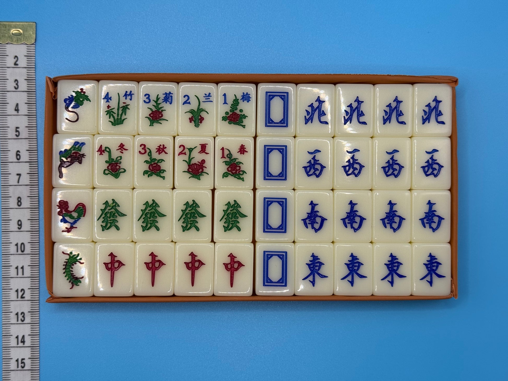 Close-up of Mahjong tiles featuring clear traditional Chinese markings