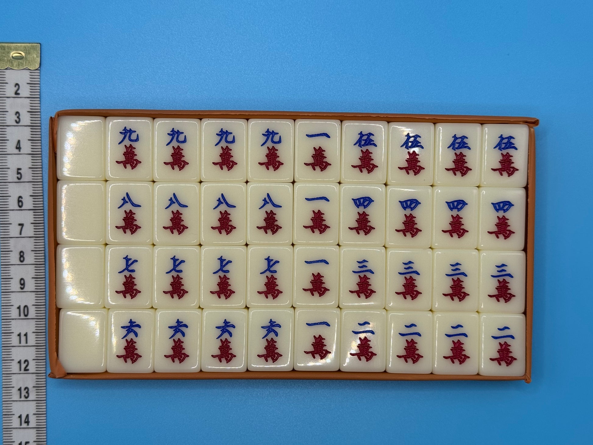 Close-up of Mahjong tiles featuring clear traditional Chinese markings