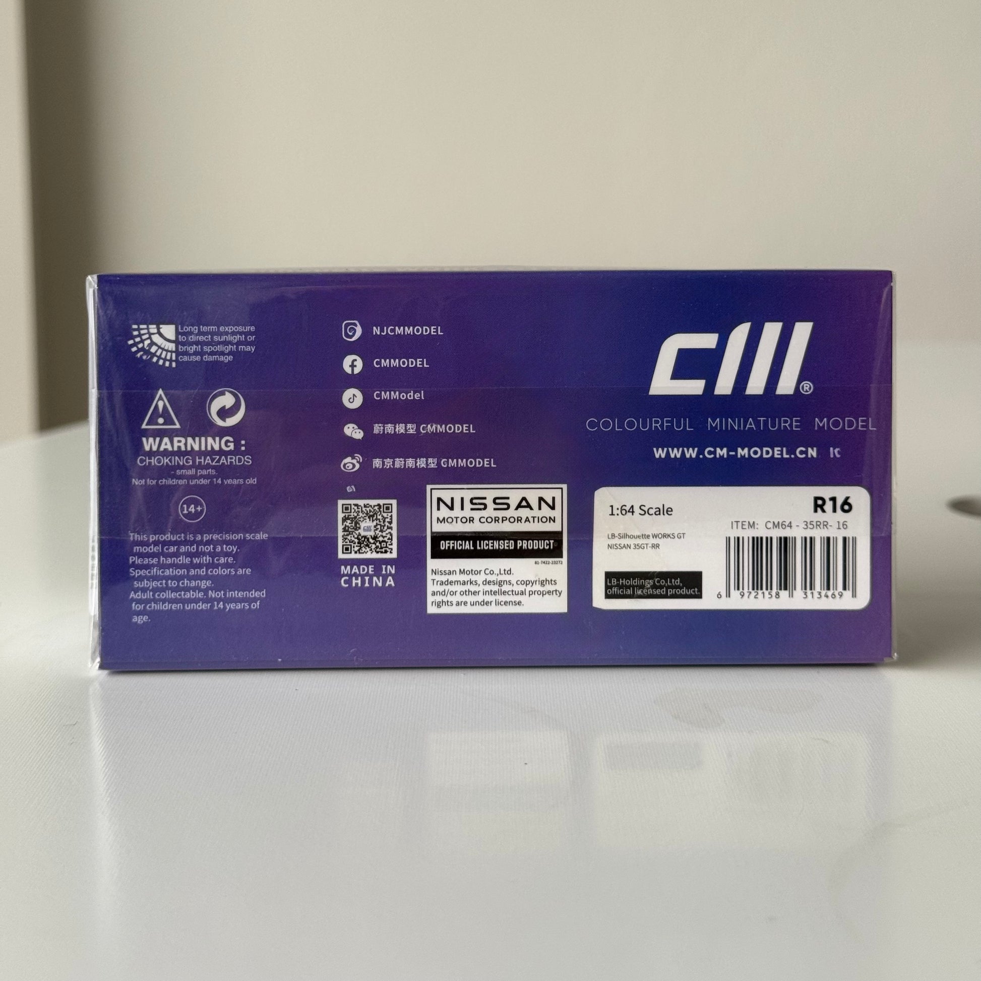 Rear view of Nissan LBWK 35GT‑RR Chameleon with Carbon display base – CM Model