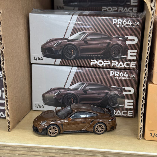 Display-ready Pop Race Porsche 992 Stinger GTR Carbon Brown