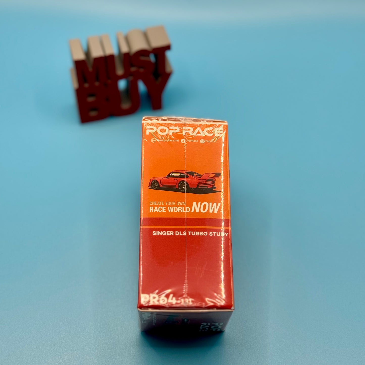 Side view of Pop Race 1:64 Singer DLS Turbo Study box packaging
