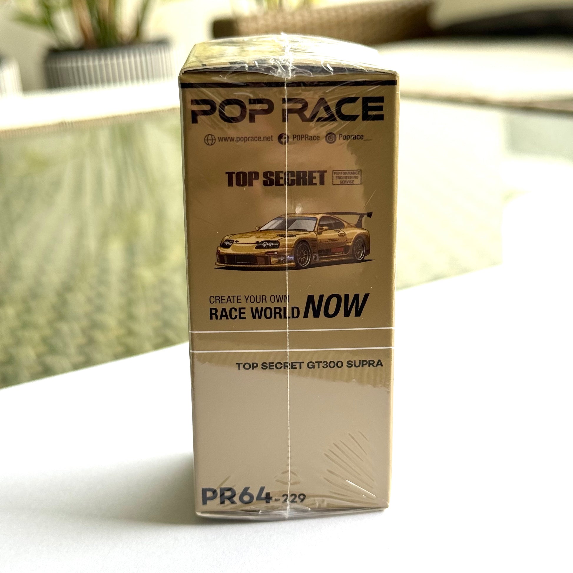 Side box featuring Pop Race GT300 Supra diecast collectible