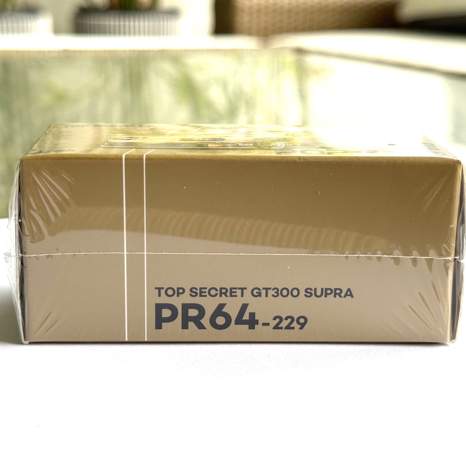 Rear angle view of Pop Race GT300 Supra diecast car box