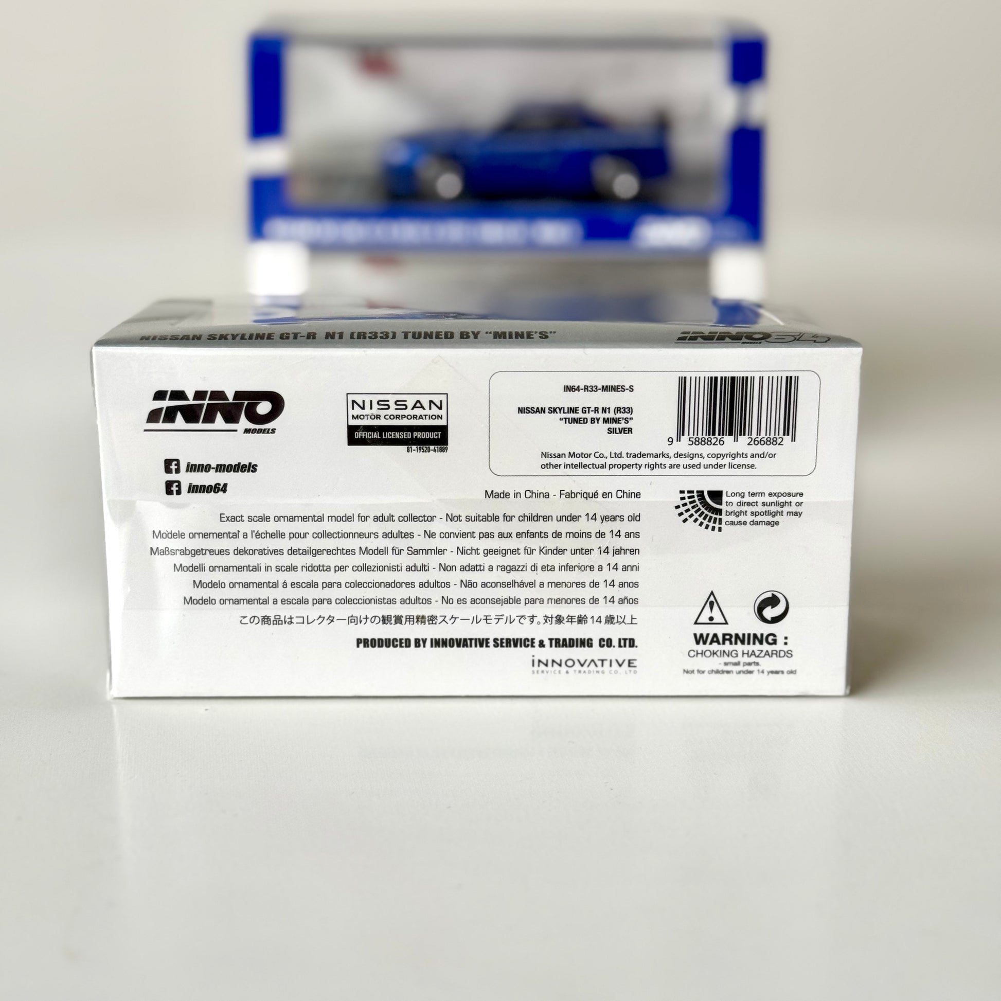 Rear packaging of Nissan Skyline R33 GT-R Mine’s Silver 1:64 diecast by INNO64