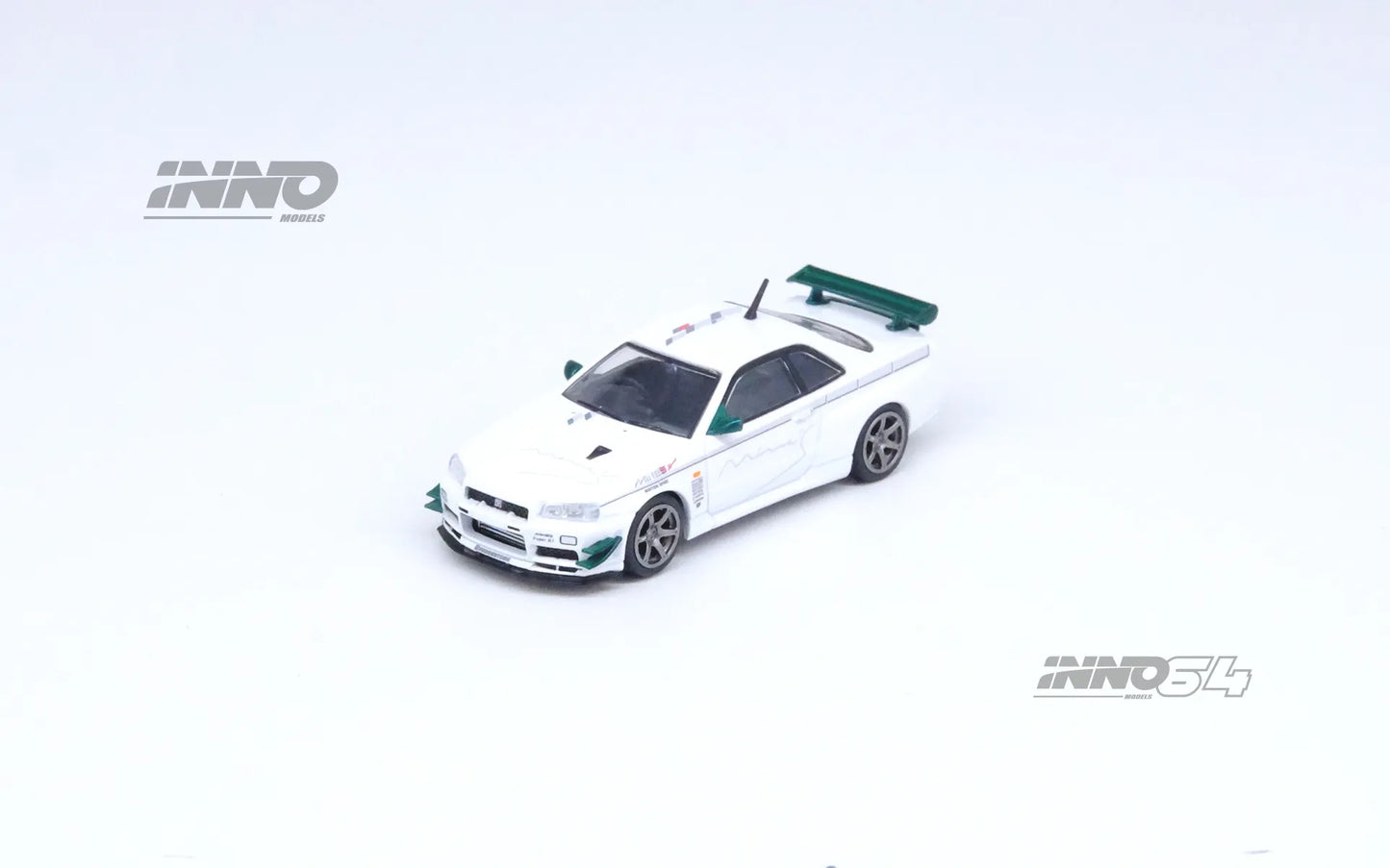Front side profile of INNO64 R34 GT-R V-Spec N1 Mine’s White out of box