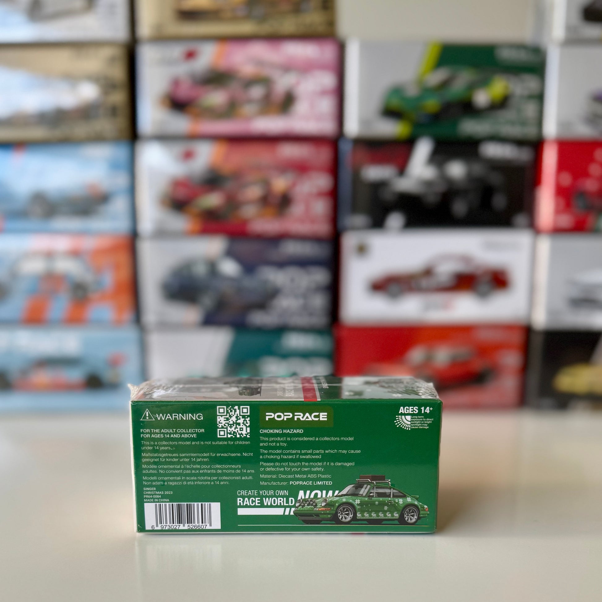 Rear angle of Singer Christmas 2023 diecast car with seasonal detailing