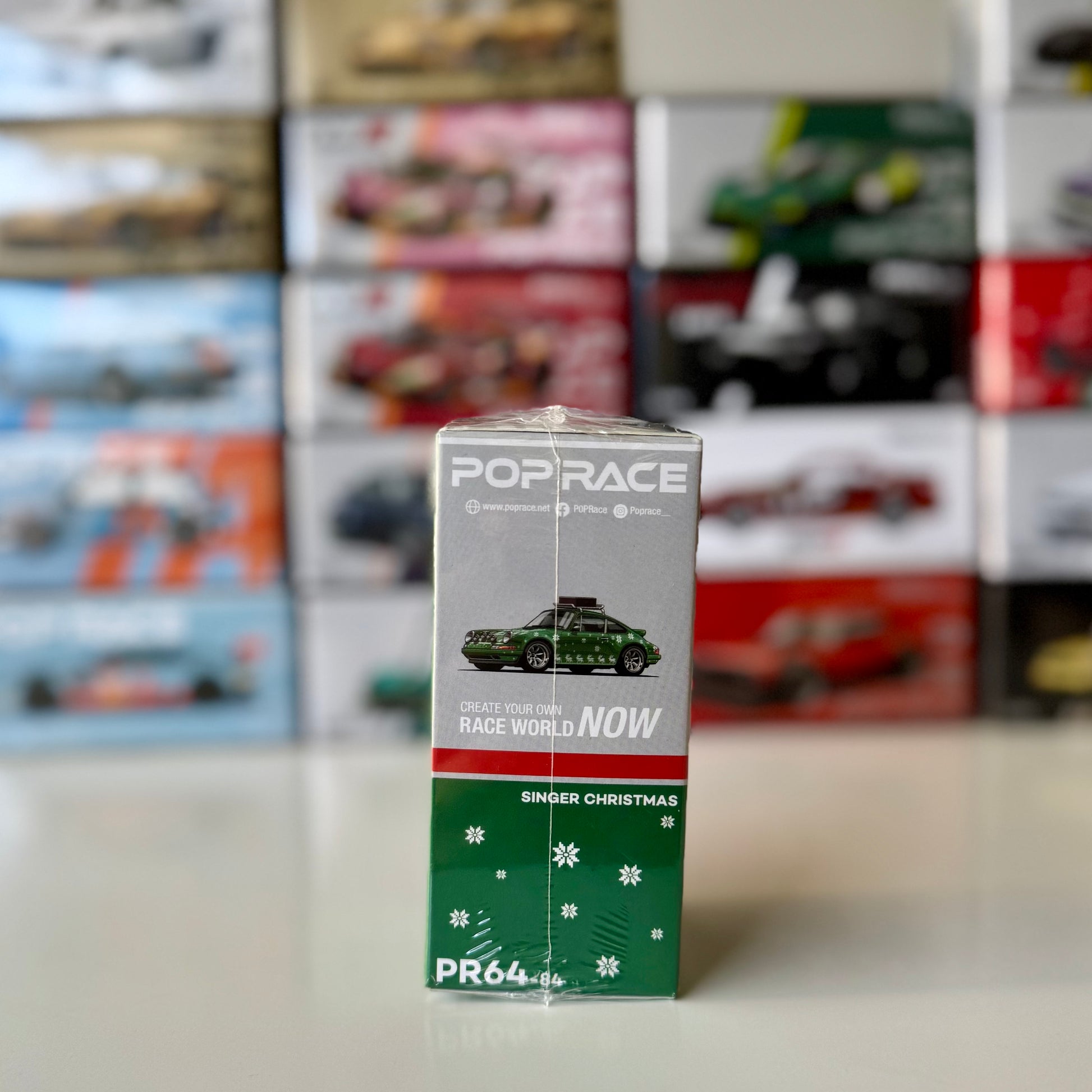 Side profile showing festive design of Pop Race Singer diecast model