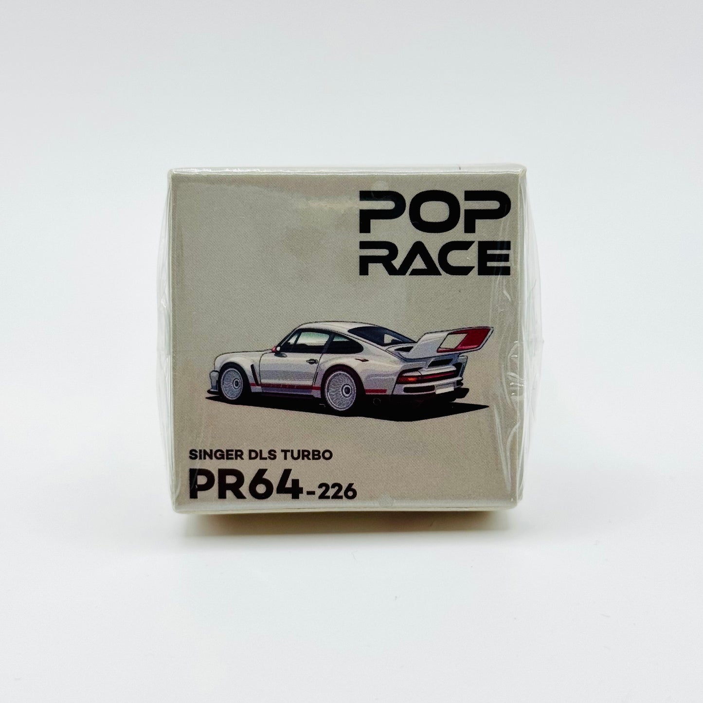 Angled boxed shot of Pop Race Singer DLS Turbo Track White diecast collectible