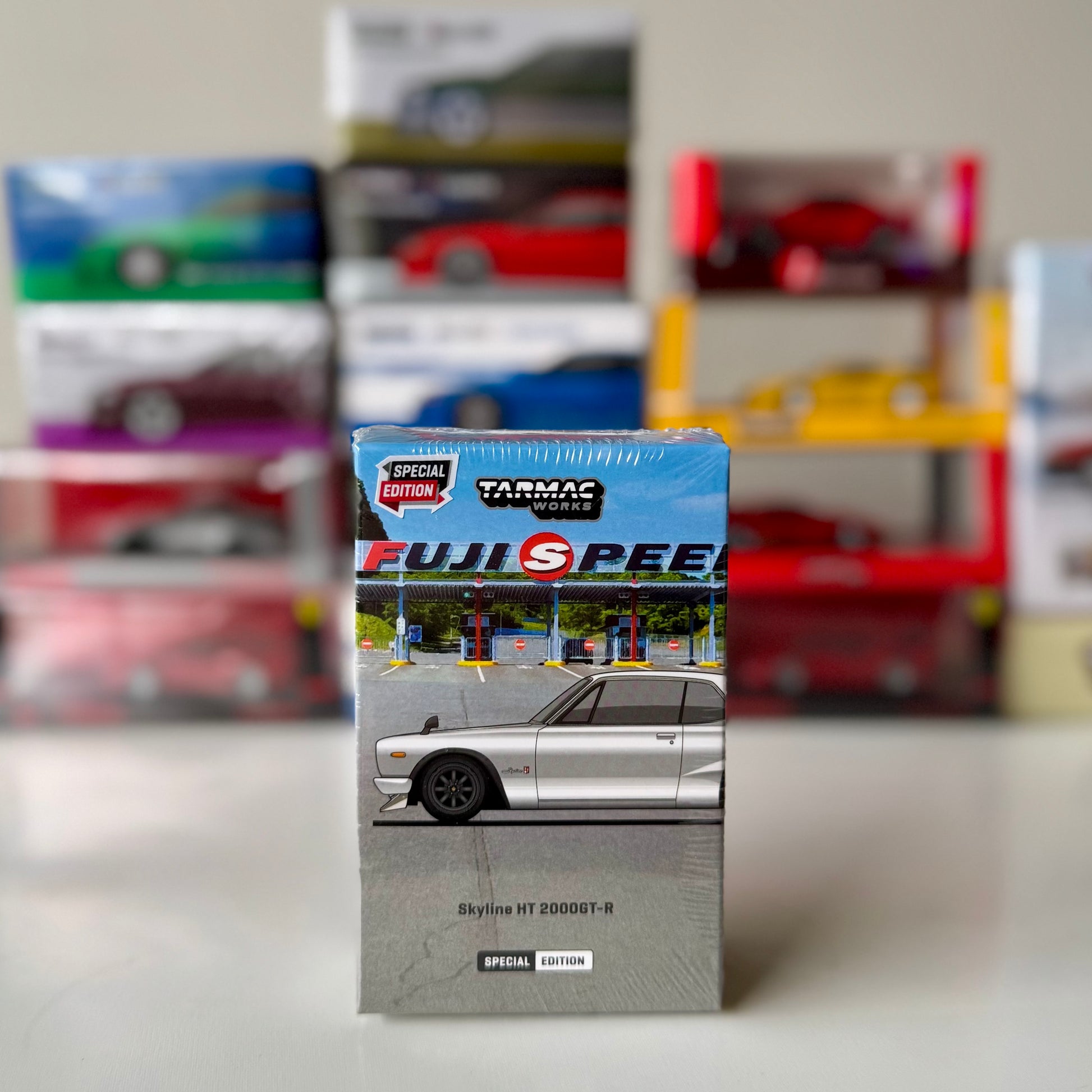 Skyline HT 2000GT-R Silver Chrome SP Edition diecast model in original Global64 box – front view