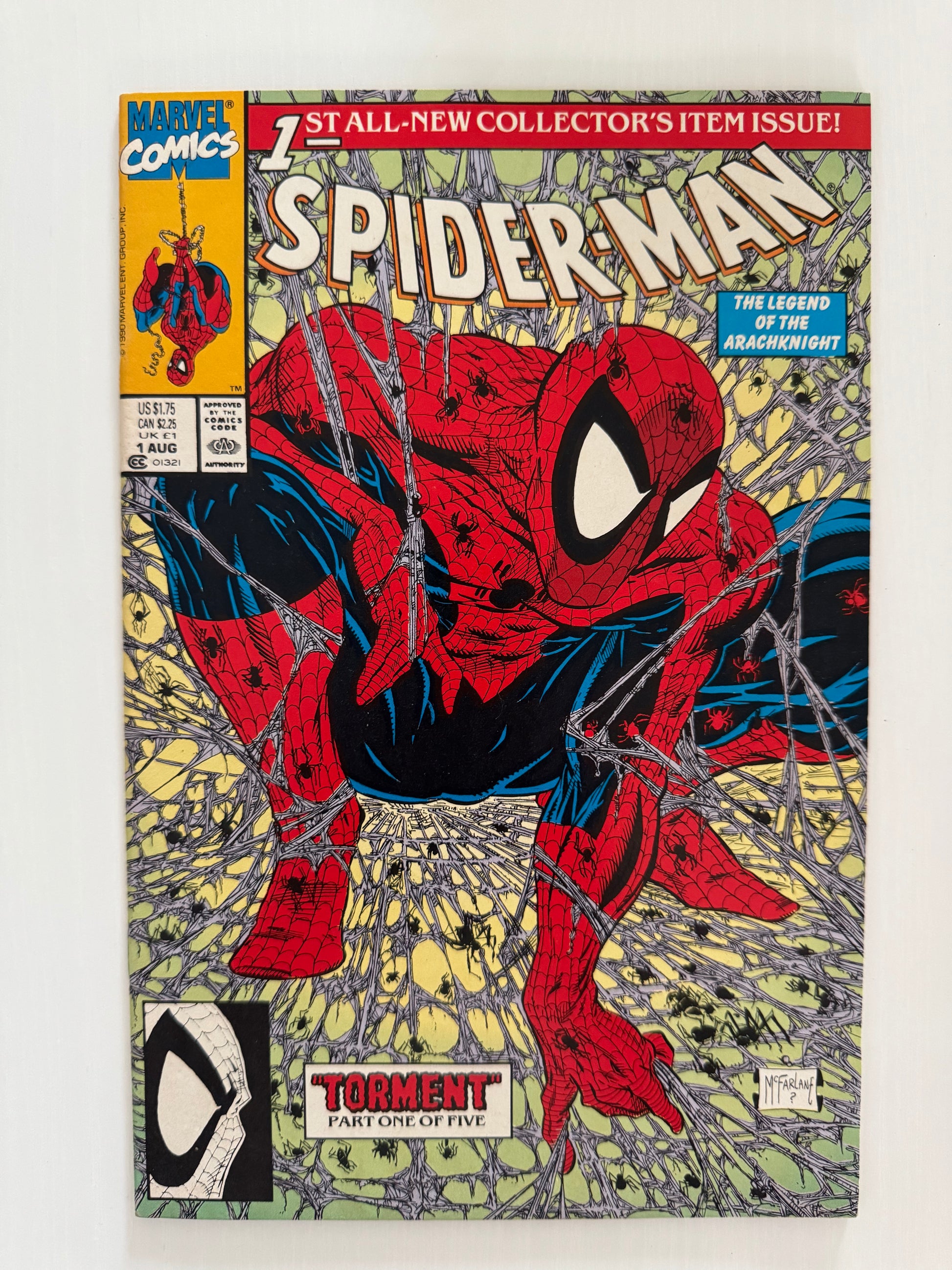 Front cover of Spider-Man #1 (1990), Part 1 of “Torment” storyline, featuring Todd McFarlane’s iconic illustration of Spider-Man crouched in a web-filled background.