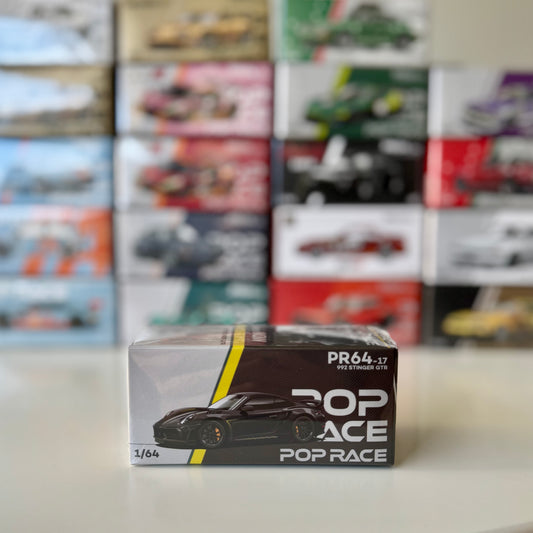 Front view of Pop Race 992 Stinger GTR Carbon Edition diecast model