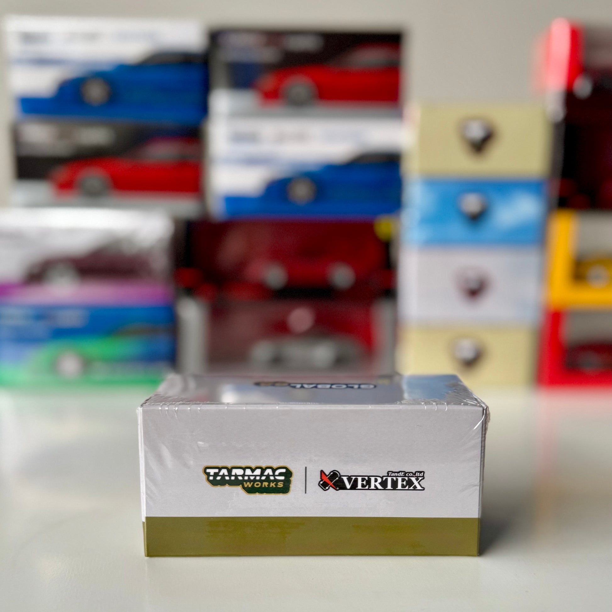 Packaging of Global64 Toyota Mark II JZX100 Vertex in Dark Green Metallic